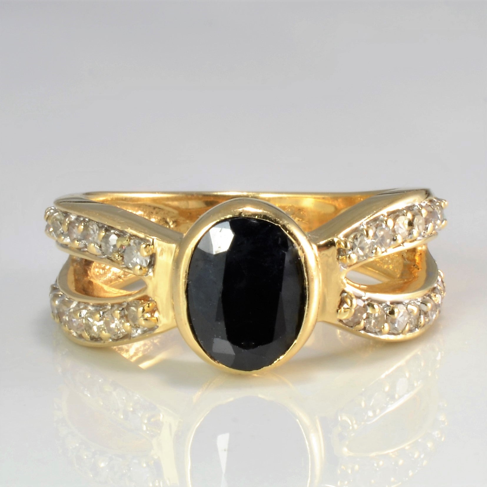 Bezel Set Sapphire & Diamond Crossover Ring | 0.36 ctw, SZ 6.75 |