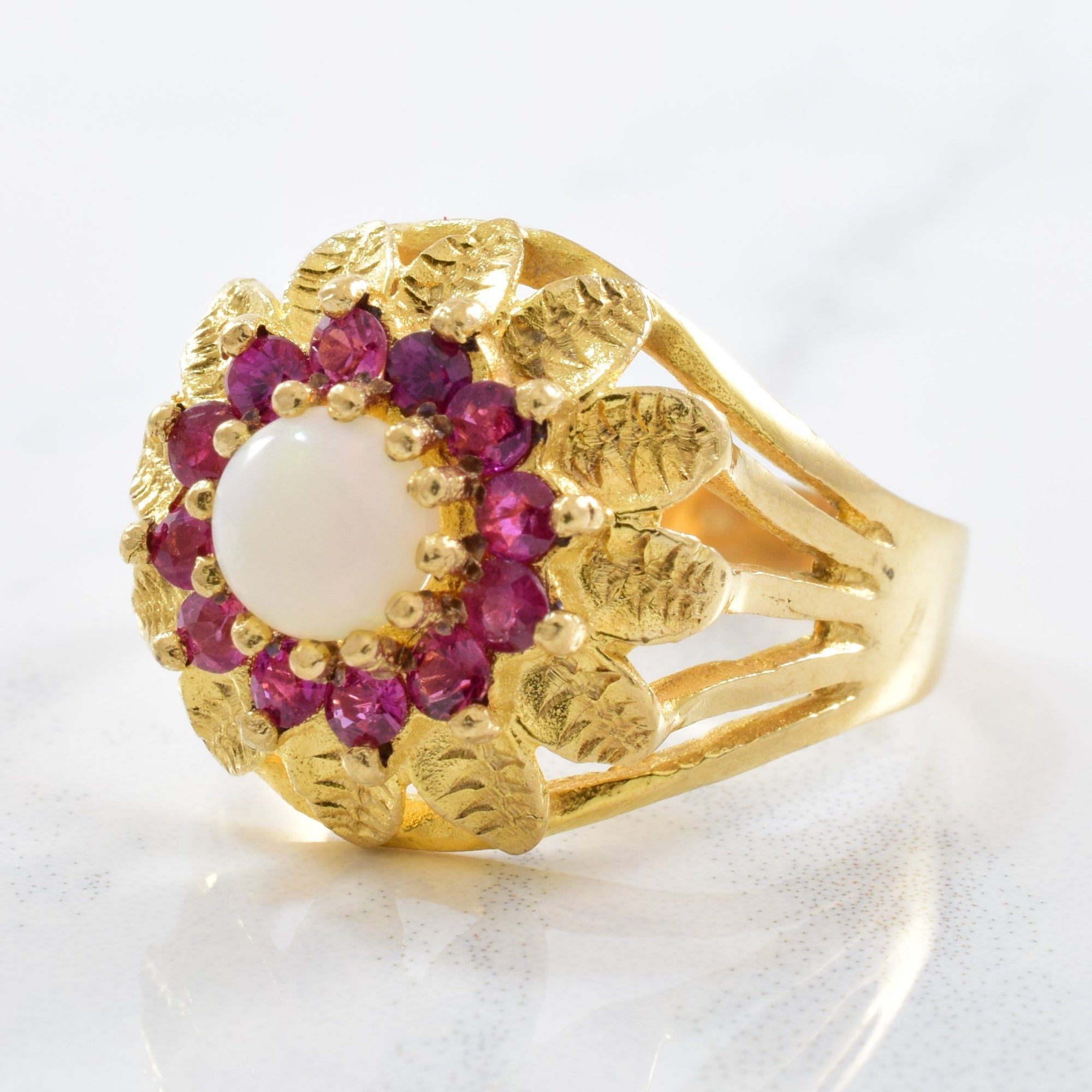 1970's Opal and Ruby Halo Ring | 0.35ct, 0.54ctw | SZ 8.25 |