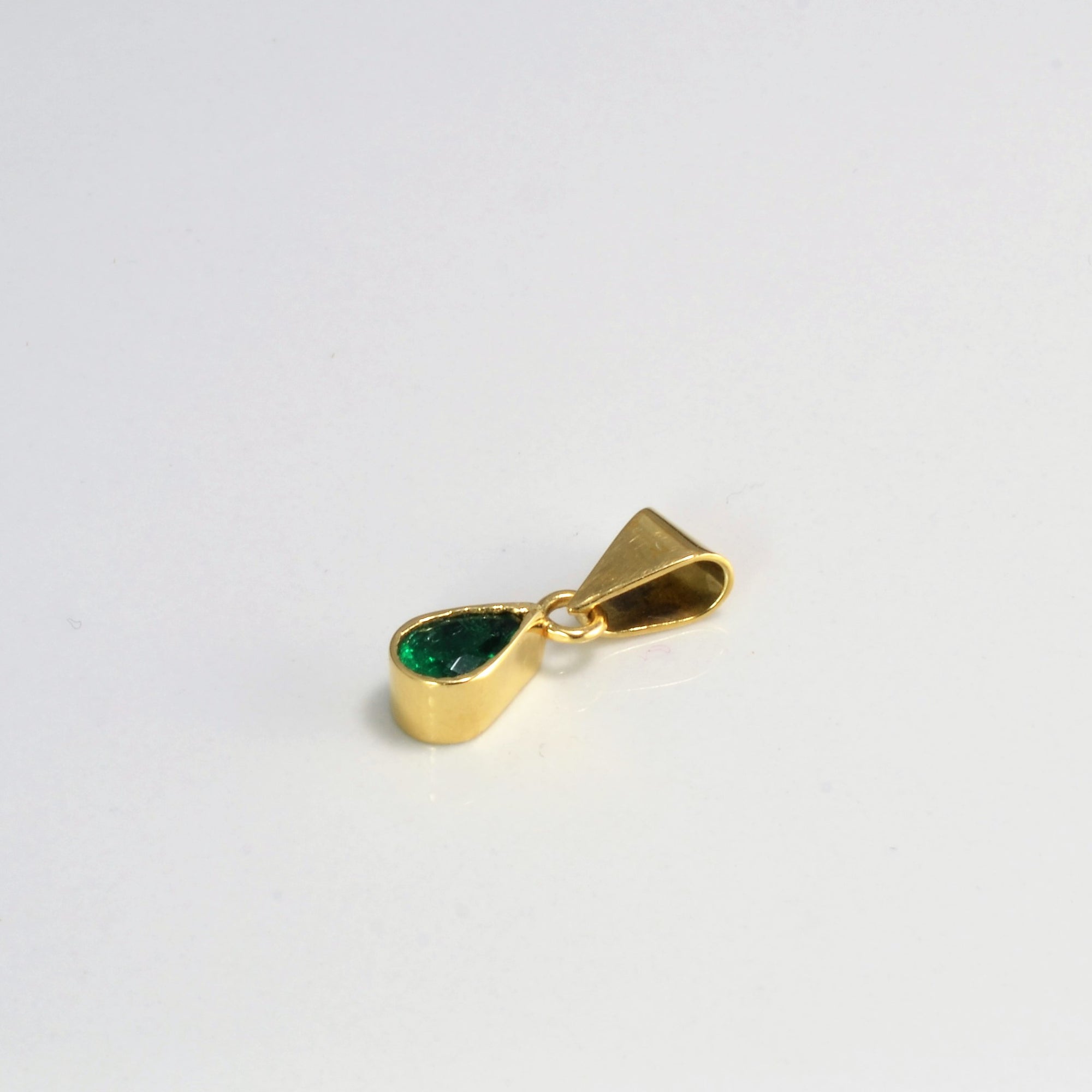 Bezel Set Emerald Pendant