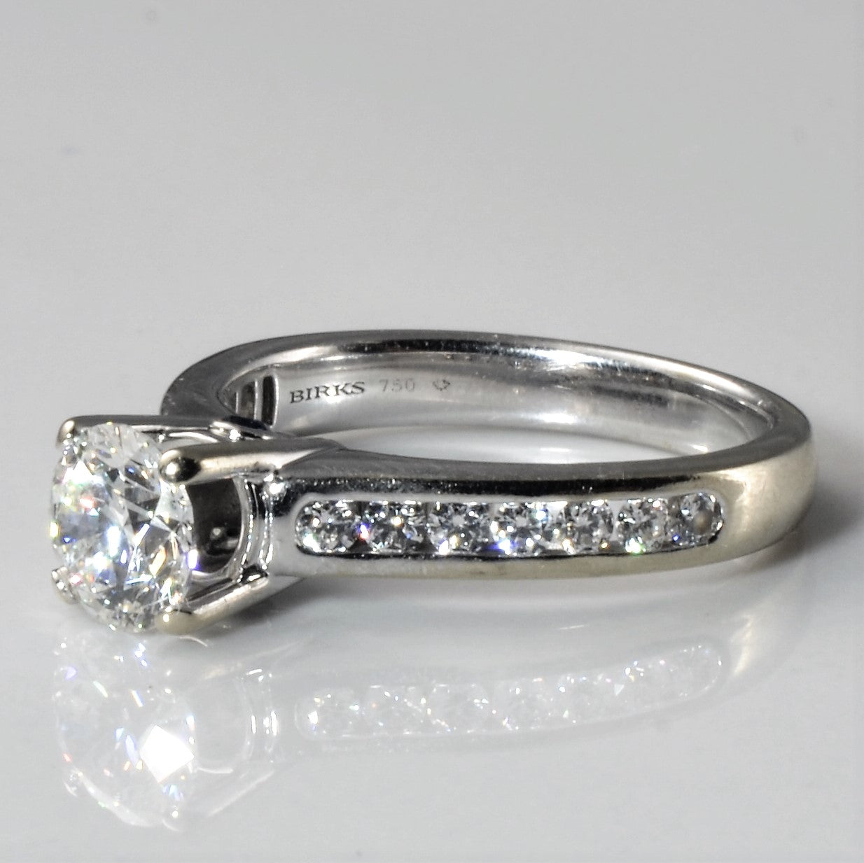 diamond side stone ring, round brilliant cut diamond ring, 