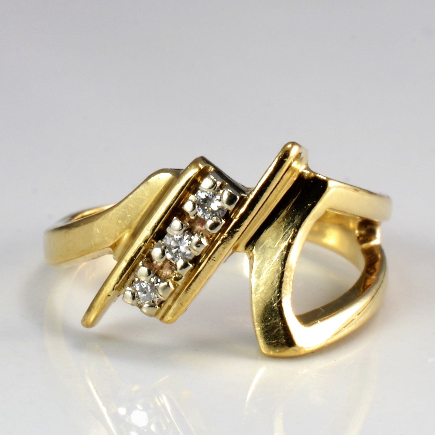 Three Stone Diamond Ring | 0.06 ctw, SZ 4.5 |