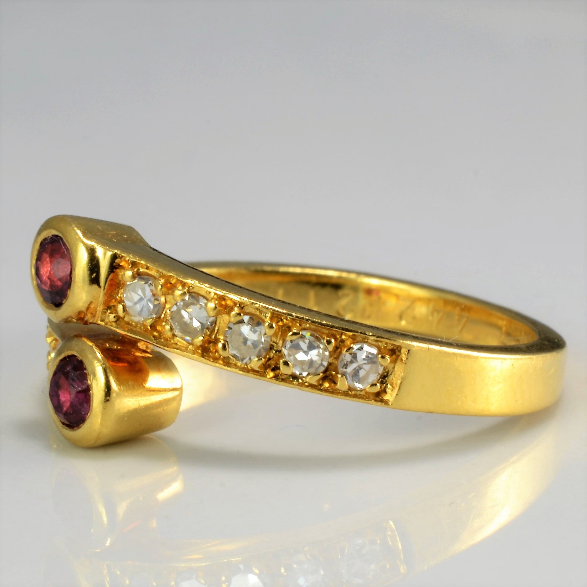 Art Nouveau Diamond & Ruby Bypass Ring | 0.20 ctw, SZ 7 |