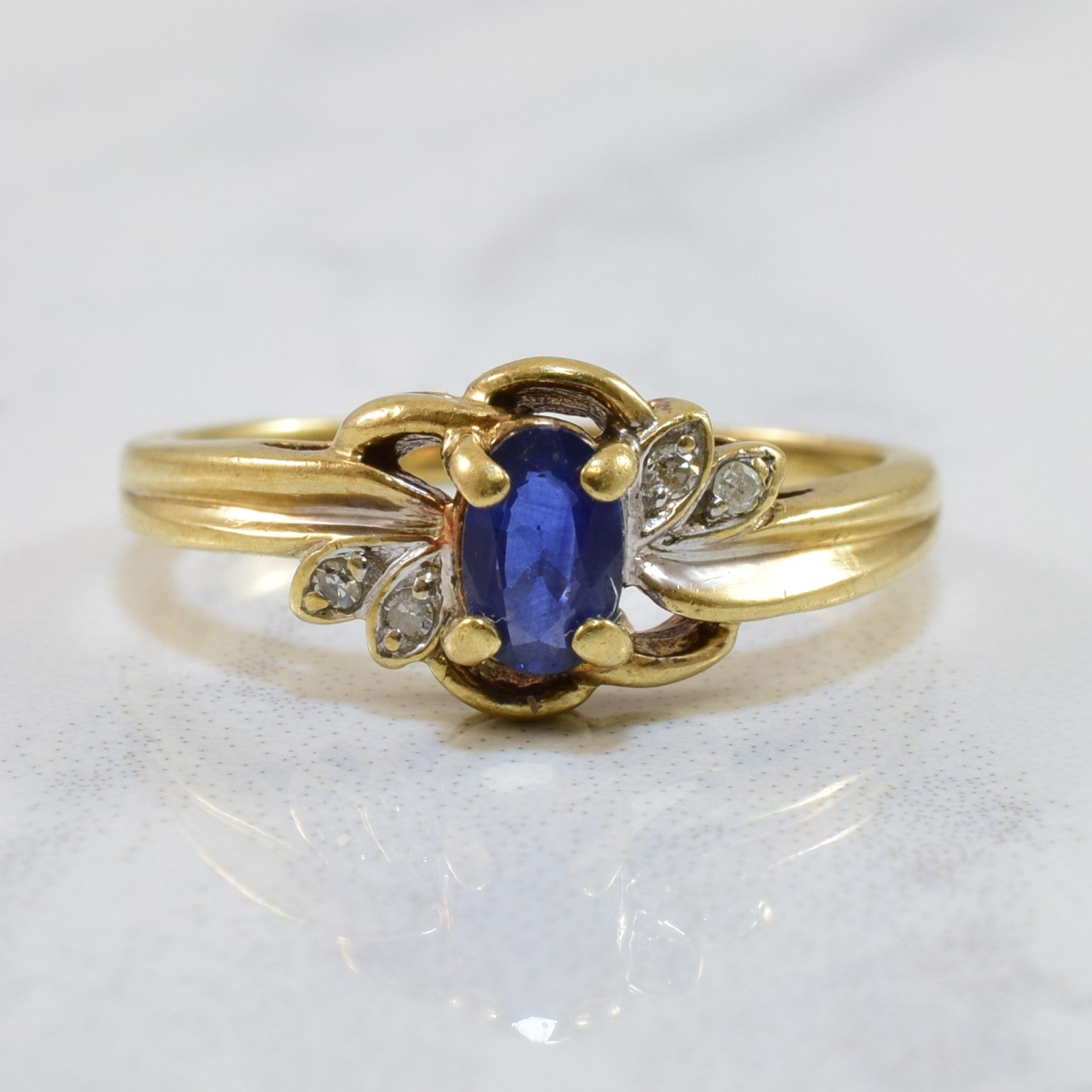 Oval Sapphire & Diamond Bypass Ring | 0.28ct, 0.02ctw | SZ 4 |