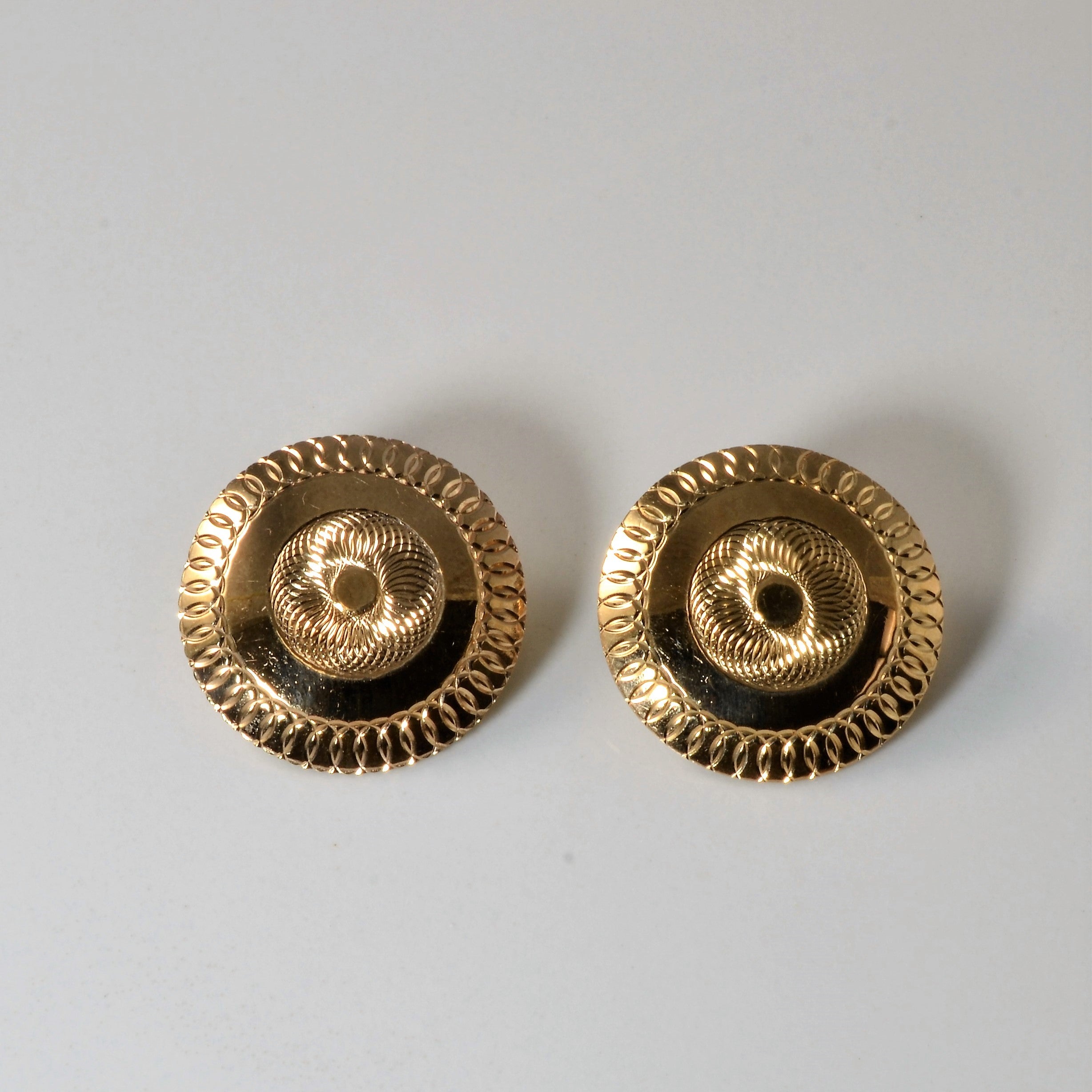 Gold Disc Swirl Earrings |