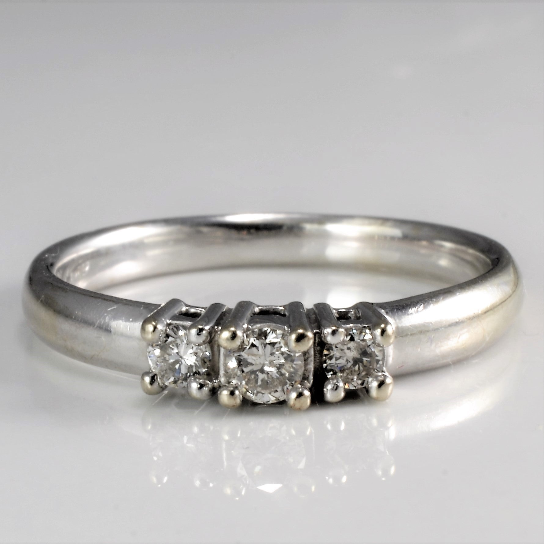 Three Stone Diamond Ladies Ring | 0.16 ctw, SZ 7 |