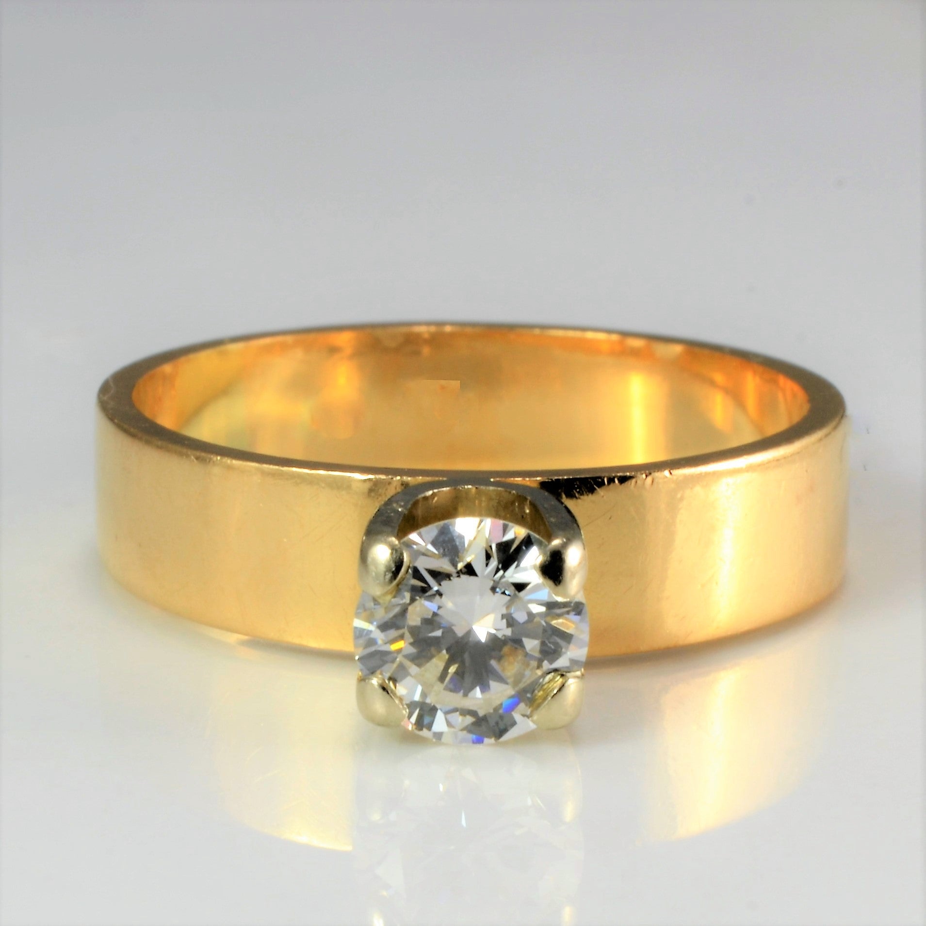Four Prong Solitaire Diamond Ring | 0.65 c t, SZ 7 |