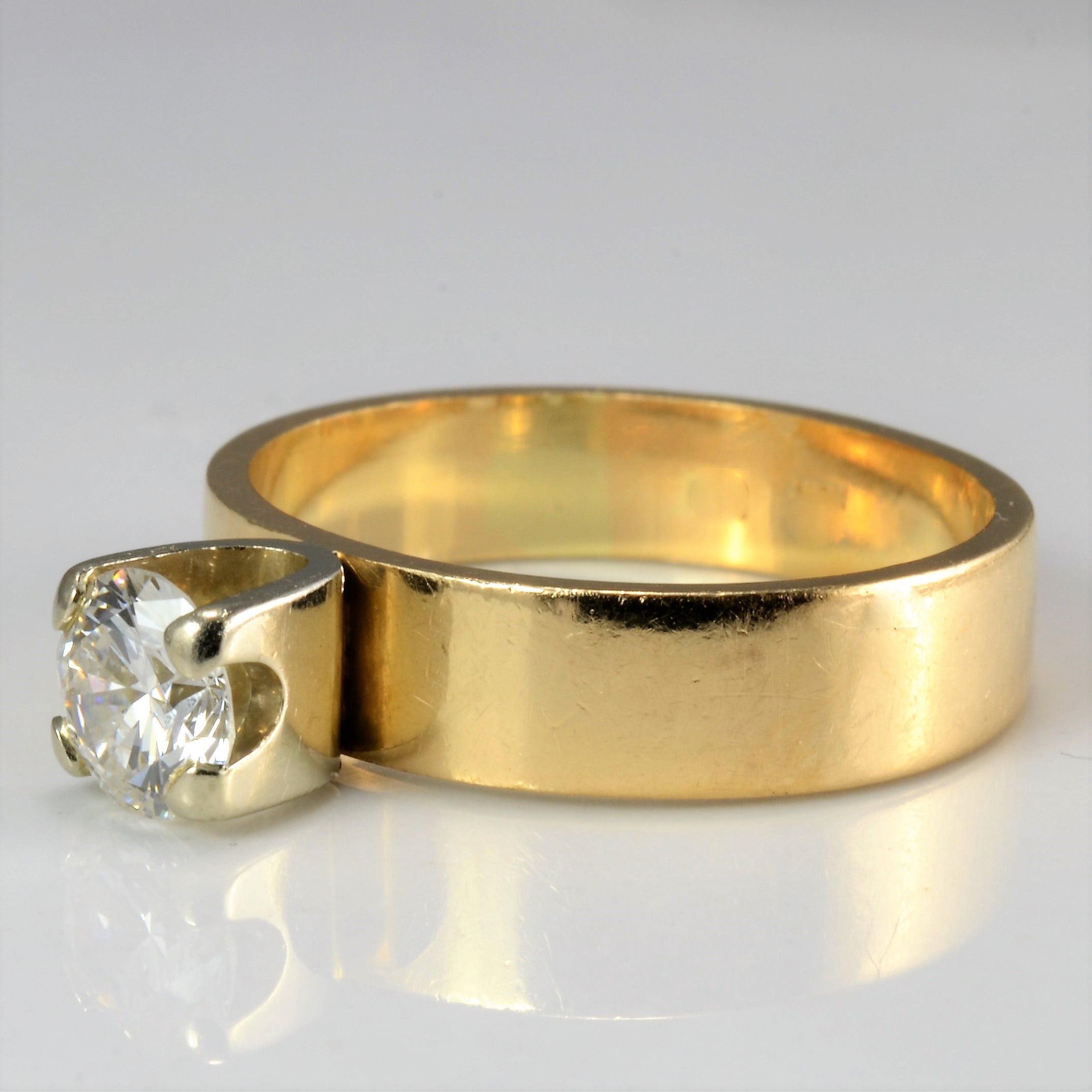 Four Prong Solitaire Diamond Ring | 0.65 c t, SZ 7 |