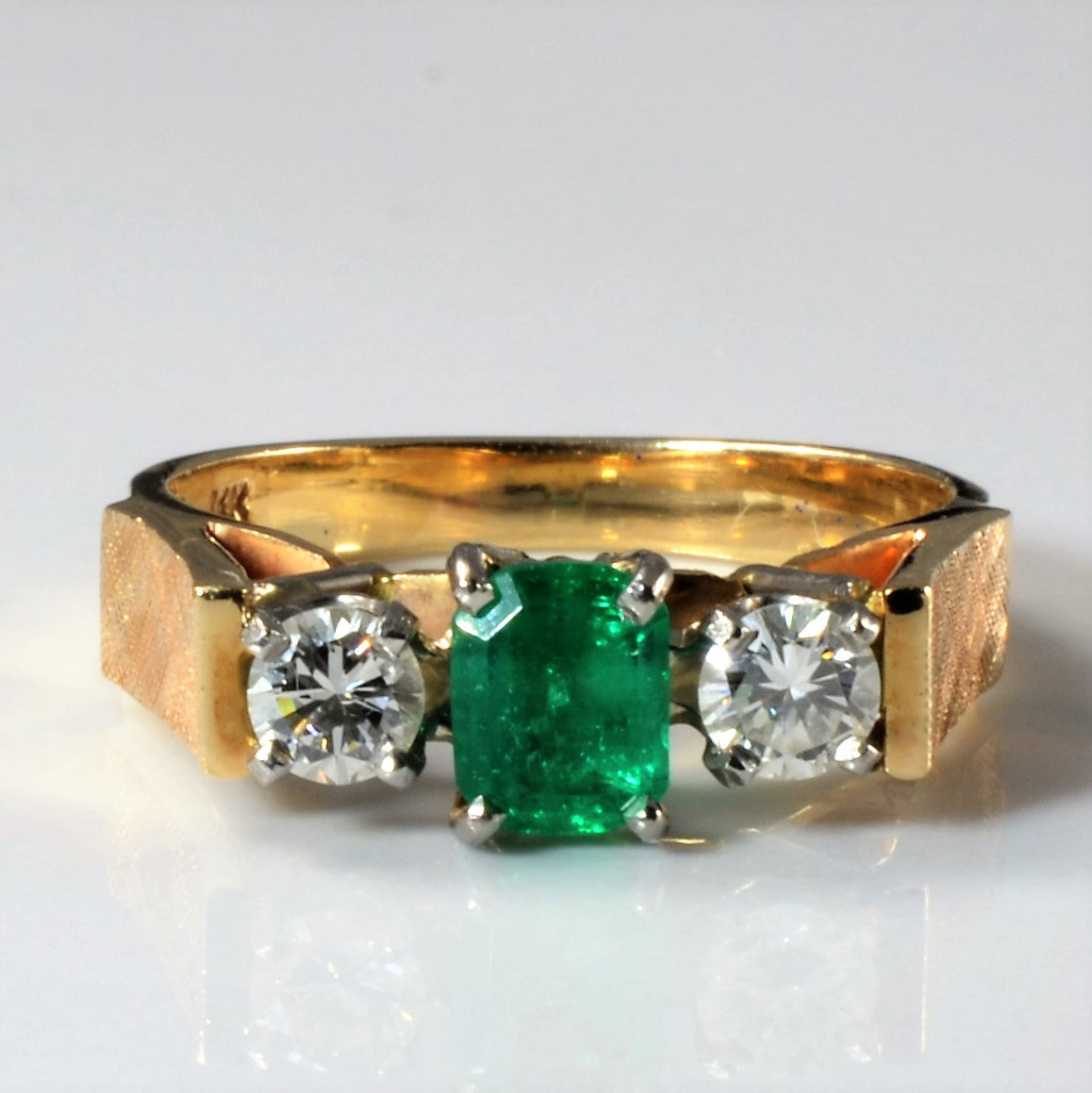 three stone ring with emerald and diamonds, vintage ring