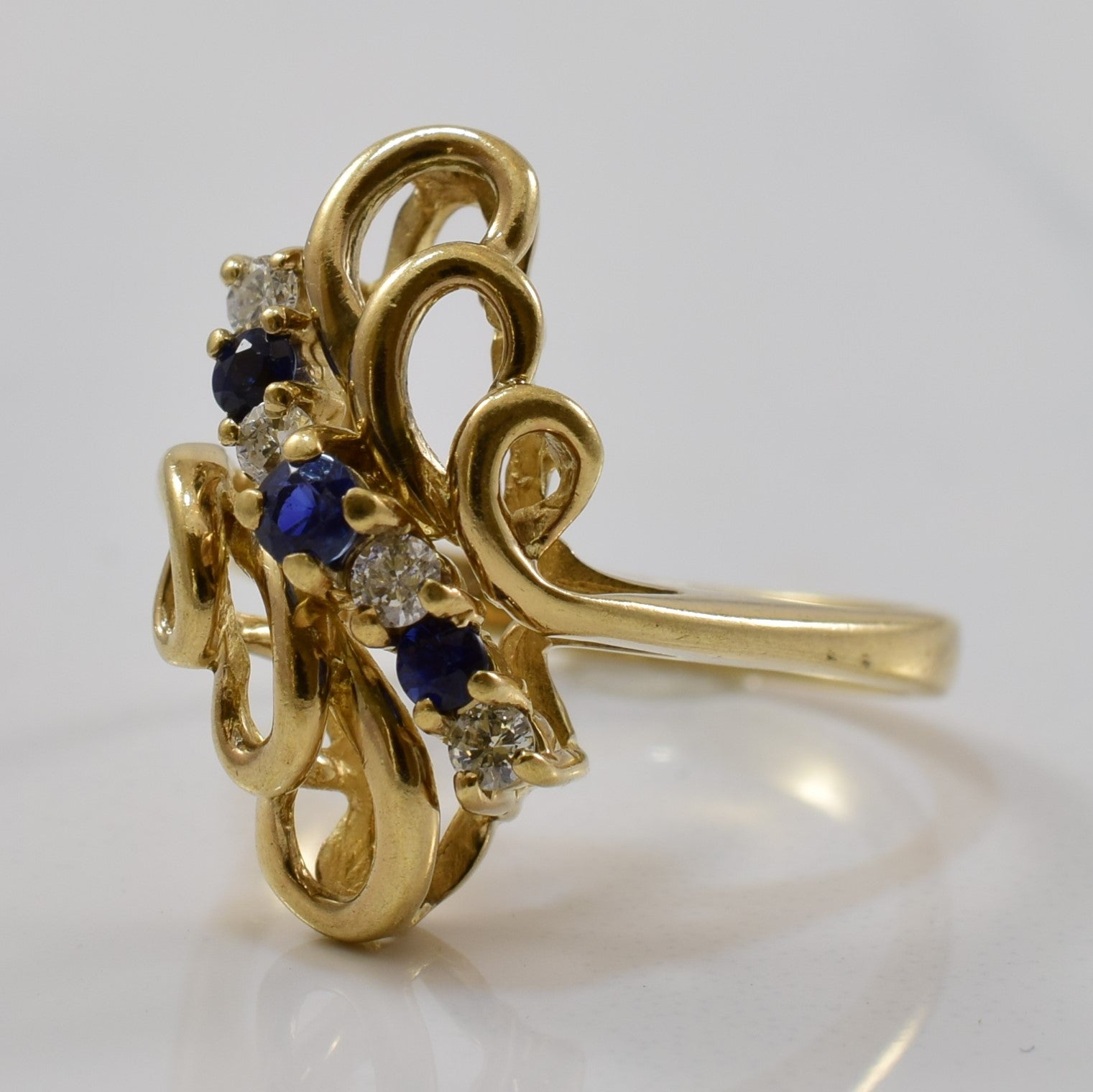 Blue Sapphire & Diamond Filigree Bypass Ring | 0.16ctw, 0.09ctw | SZ 4.75 |