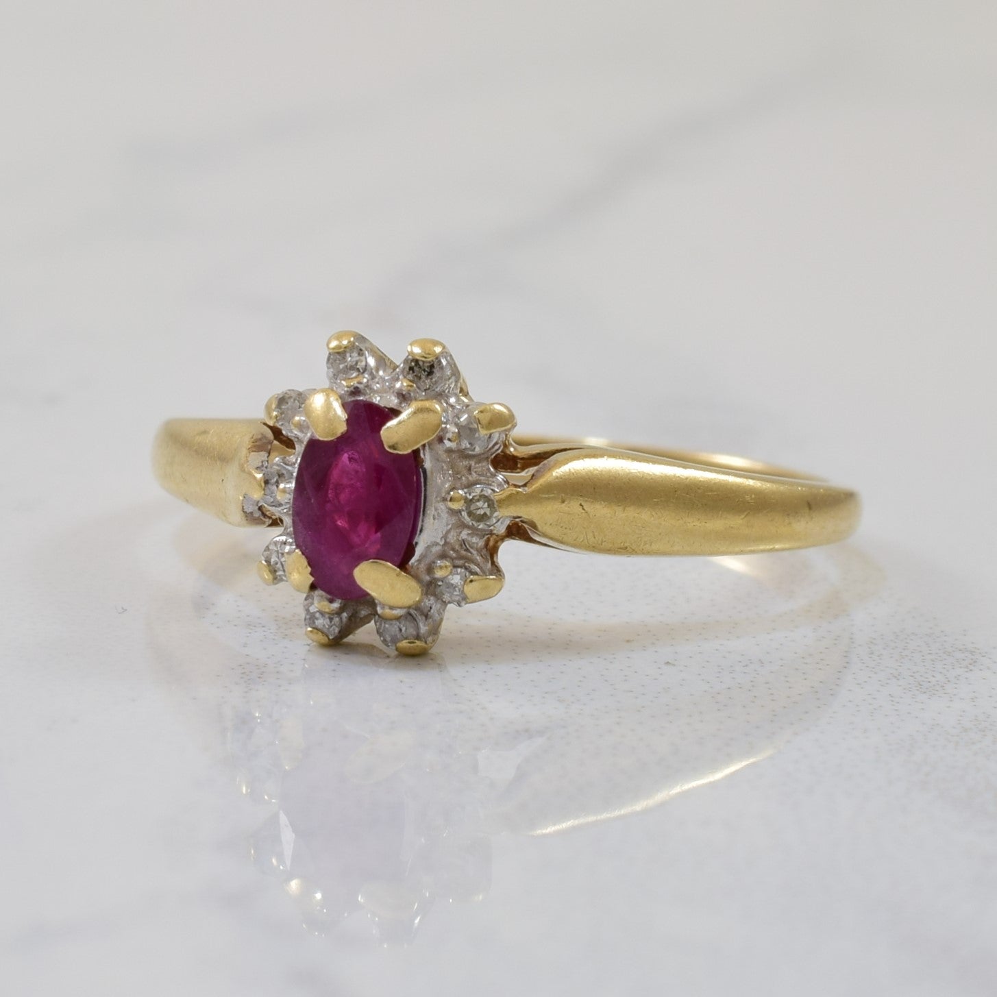 Oval Cut Ruby & Diamond Halo Ring | 0.25ct, 0.05ctw | SZ 6.75 |