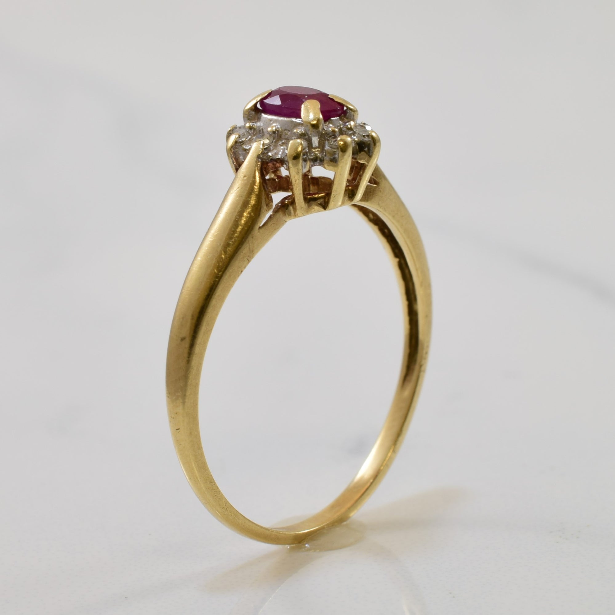 Oval Cut Ruby & Diamond Halo Ring | 0.25ct, 0.05ctw | SZ 6.75 |