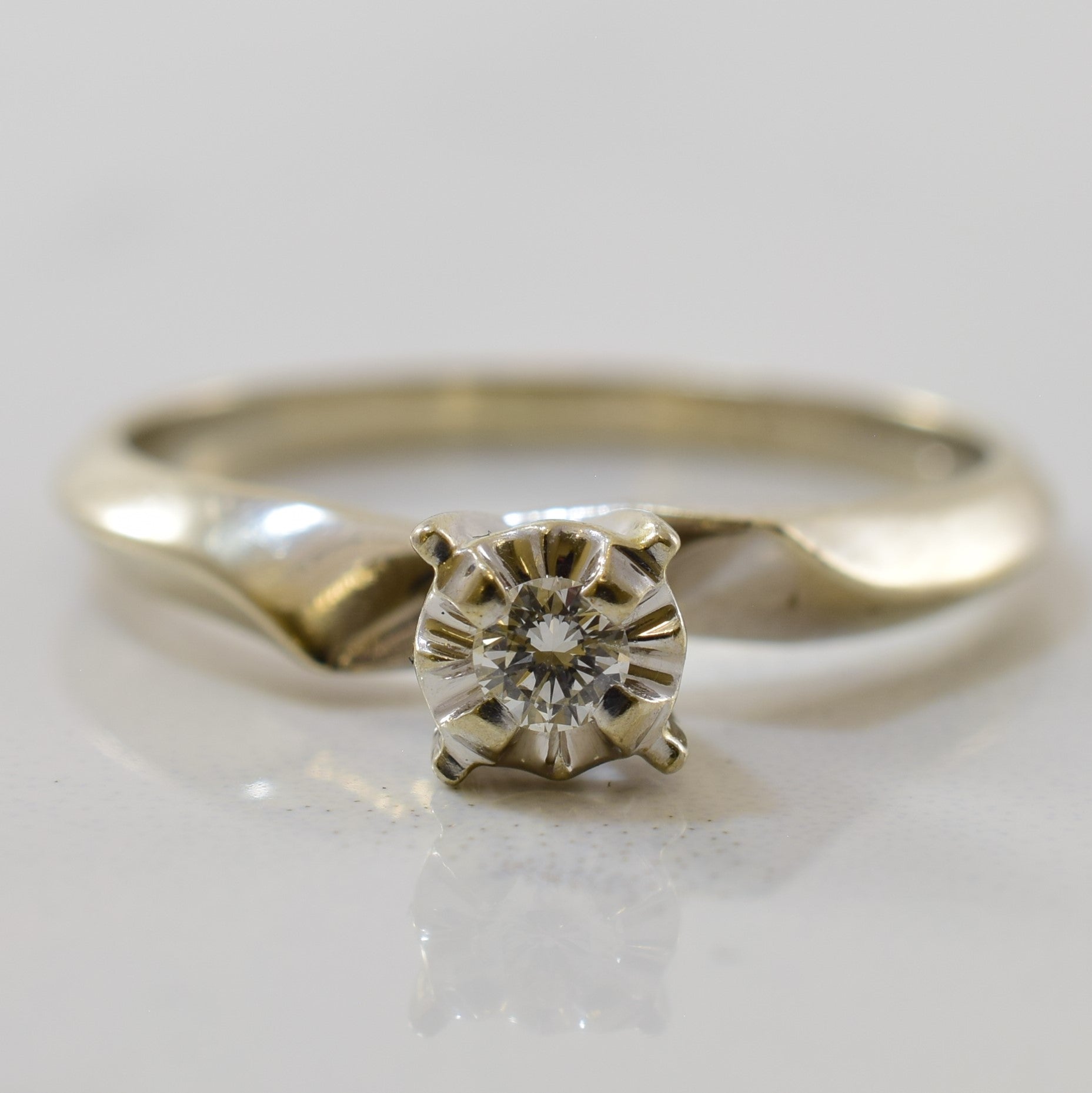 Illusion Set Diamond Bypass Solitaire Ring | 0.06ct | SZ 6.75 |