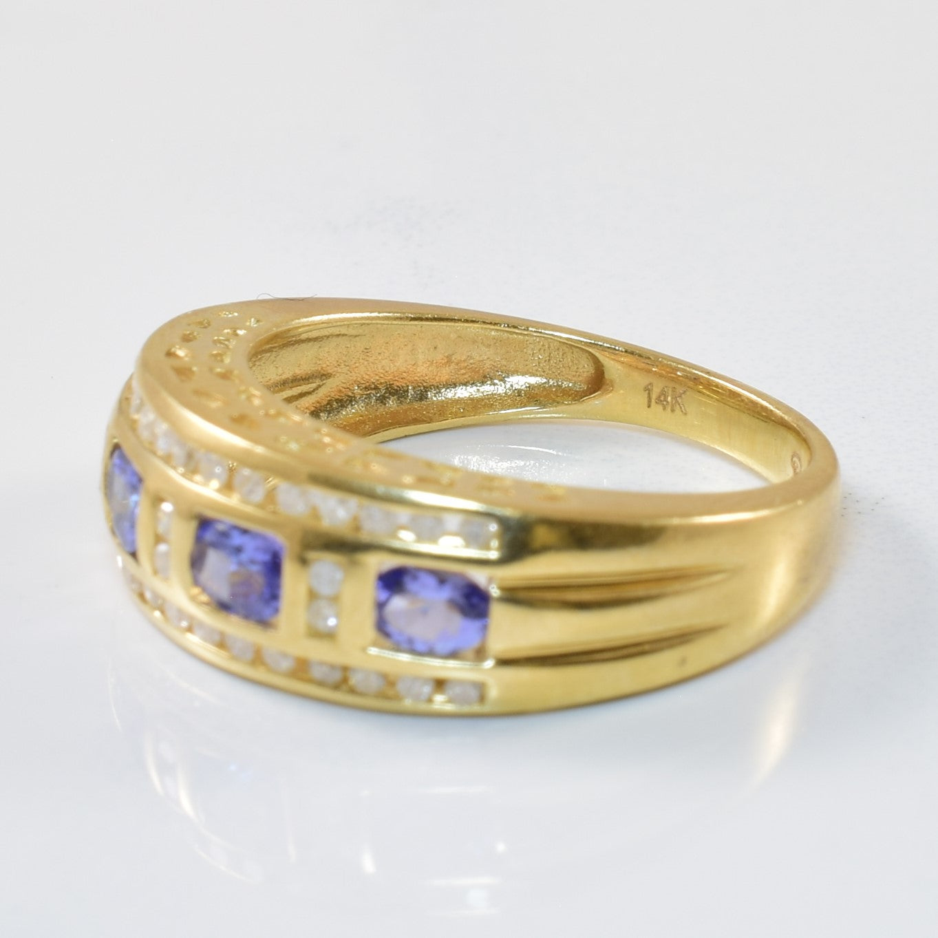 Channel Set Tanzanite & Diamond Ring | 0.68ct, 0.18ctw | SZ 7.75 |