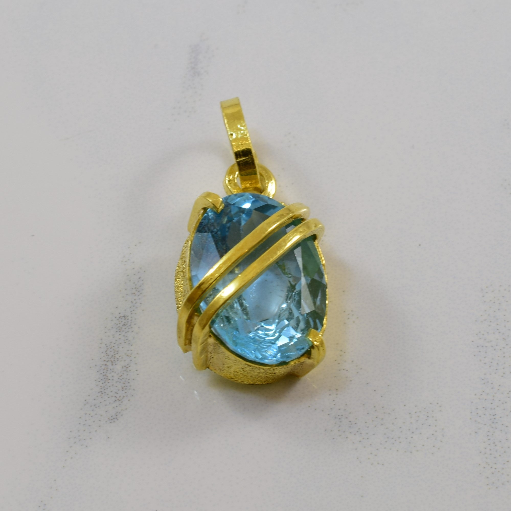 Blue Topaz Gold Bypass Pendant | 11.84ct |