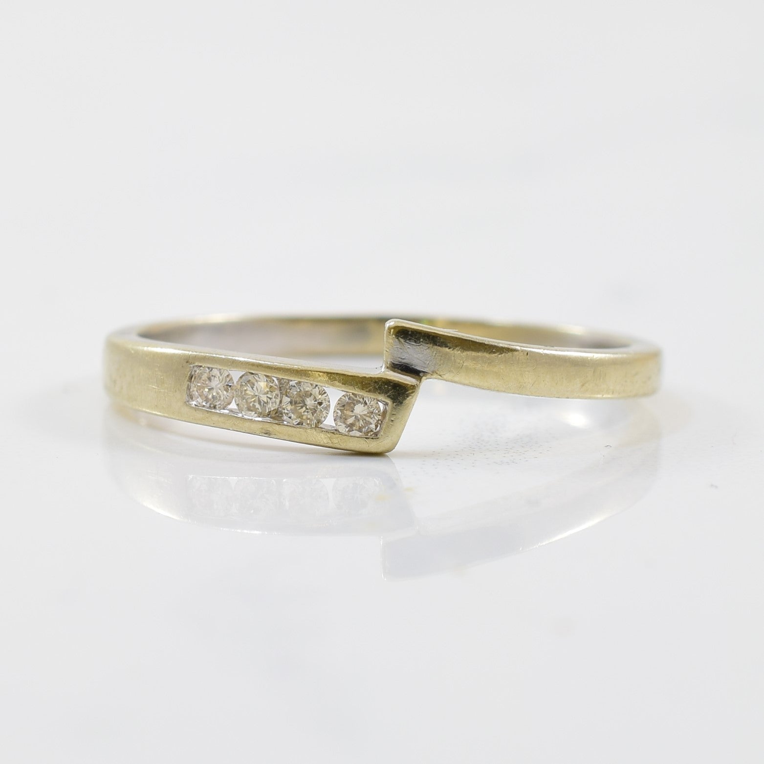 Four Stone Diamond Bypass Ring | 0.08ctw | SZ 7.75 |