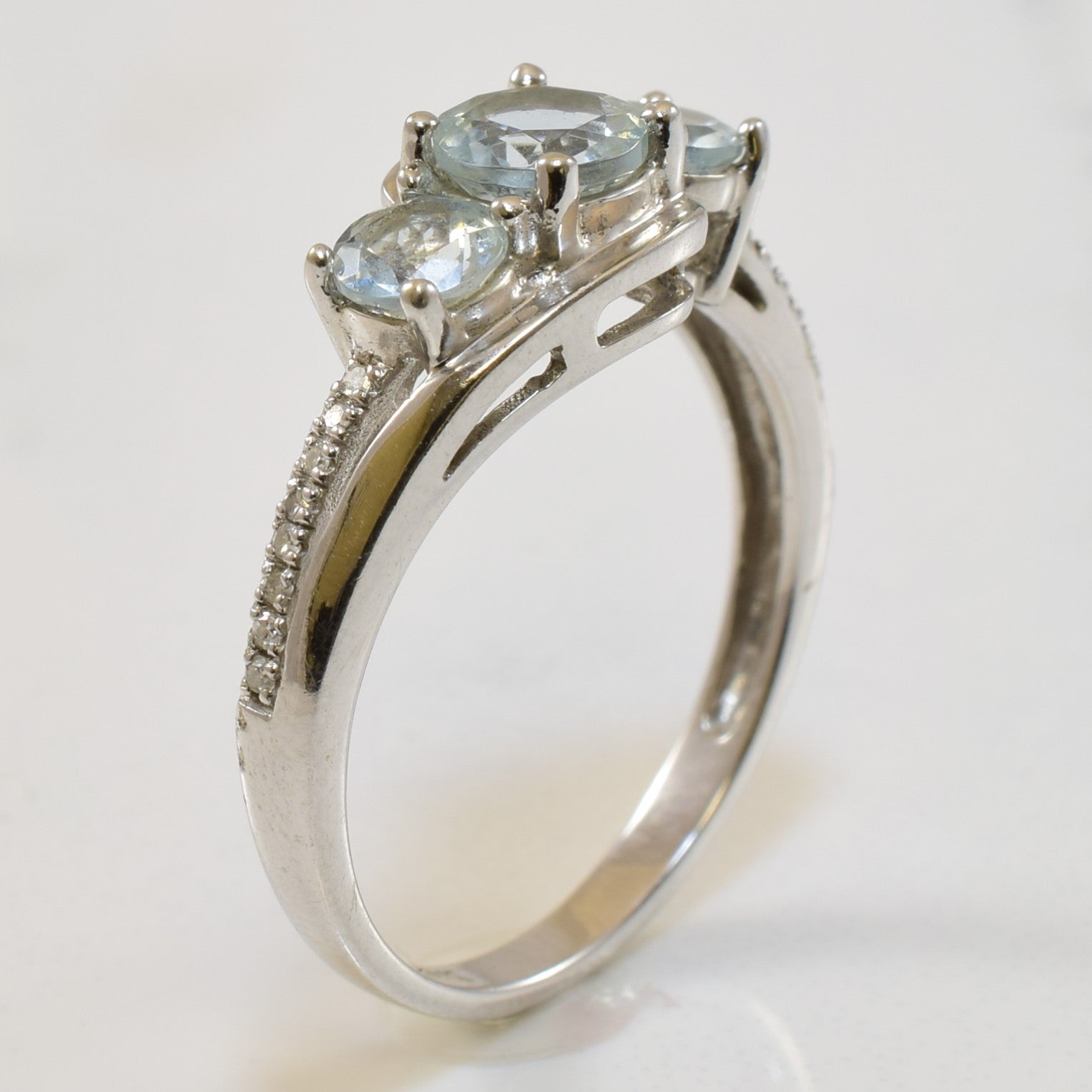 Three Stone Aquamarine & Diamond Bypass Ring | 0.90ctw, 0.06ctw | SZ 6.5 |