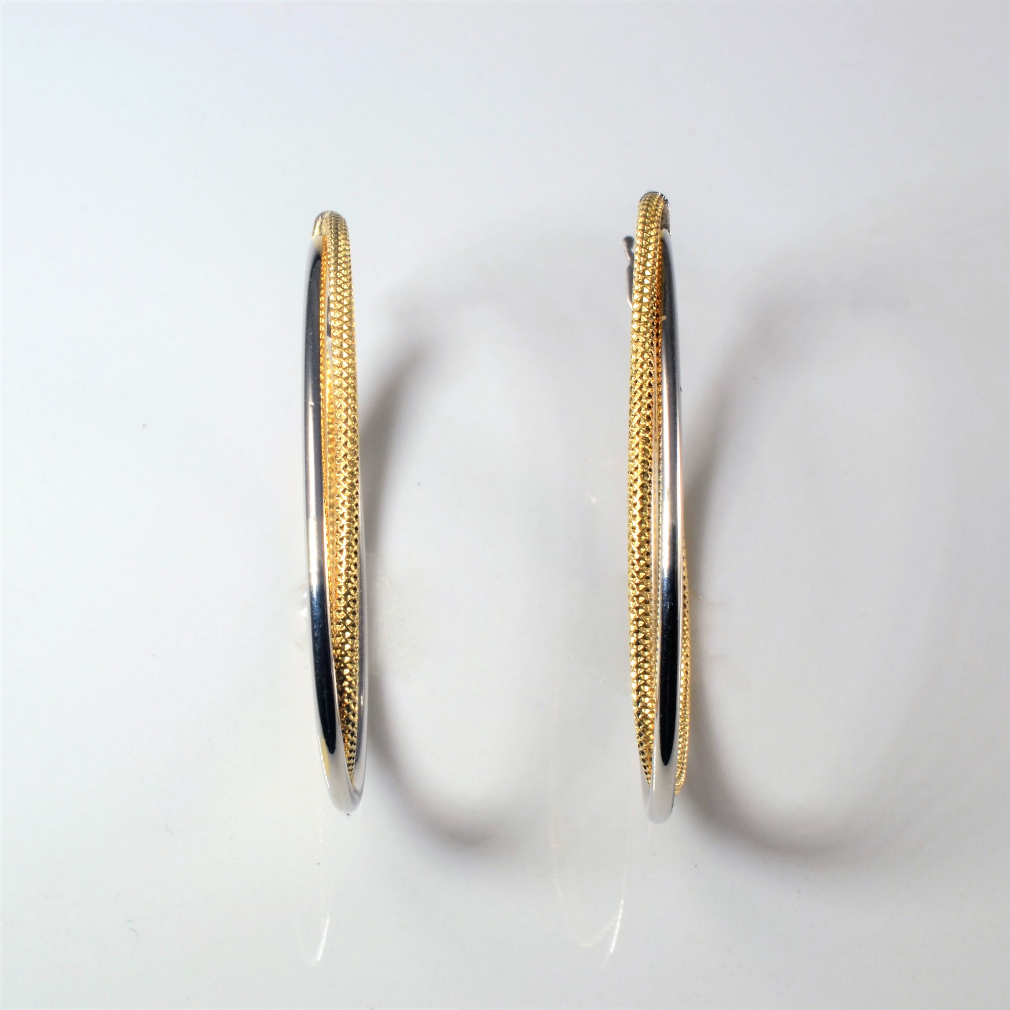 Two Tone Bypass Hoop Earrings |