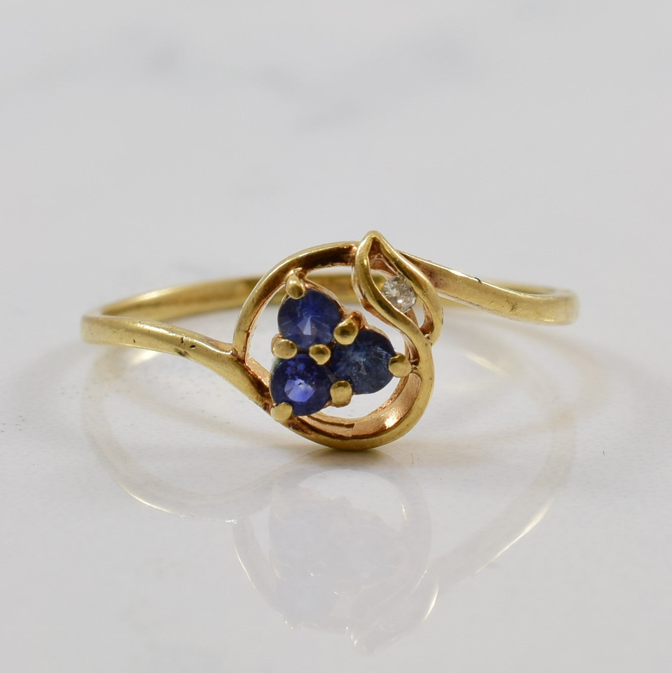 Floral Twist Sapphire & Diamond Ring | 0.10ctw, 0.01ct | SZ 5.25 |