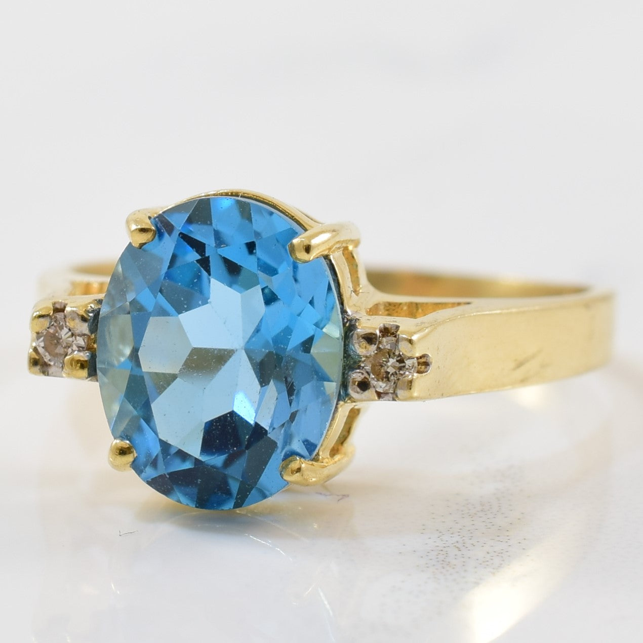 Three Stone Blue Topaz & Diamond Ring | 0.04ctw, 3.50ct | SZ 8.25 |
