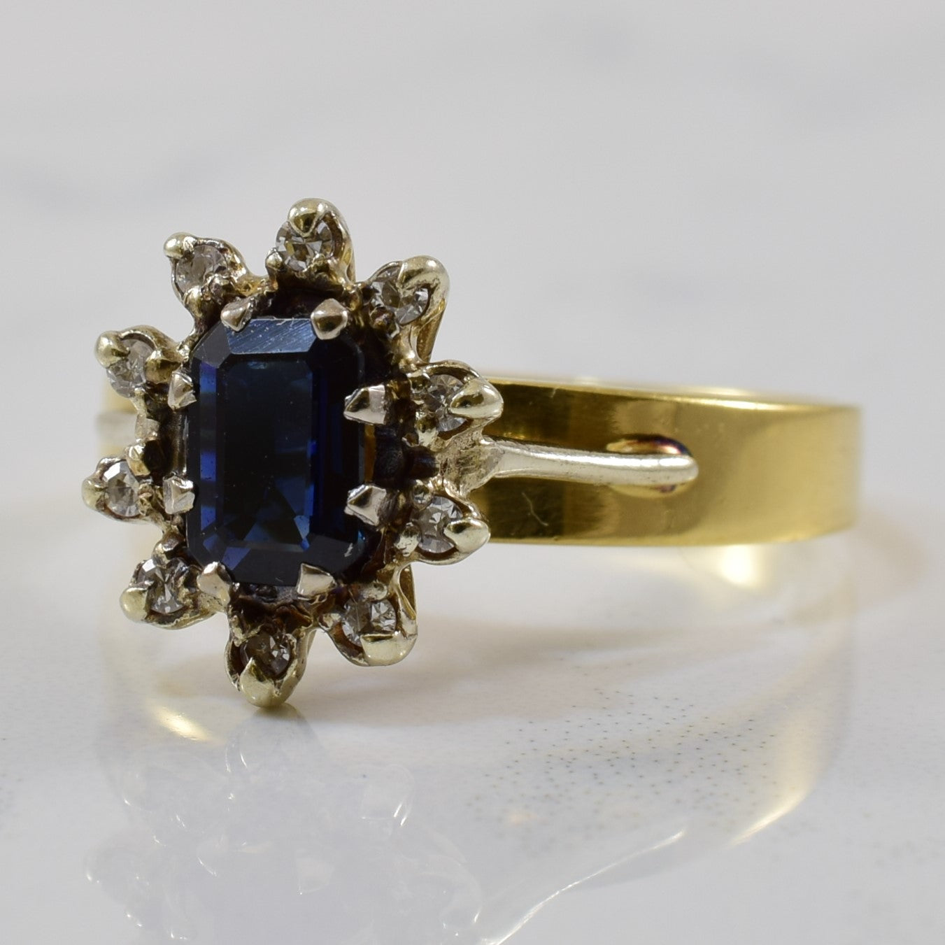 Blue Sapphire & Diamond Halo Ring | 0.65ct, 0.06ctw | SZ 6 |