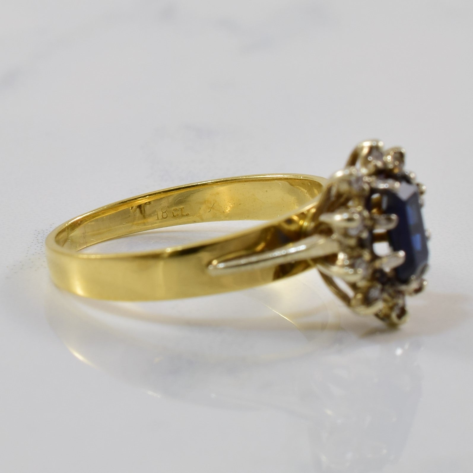 Blue Sapphire & Diamond Halo Ring | 0.65ct, 0.06ctw | SZ 6 |