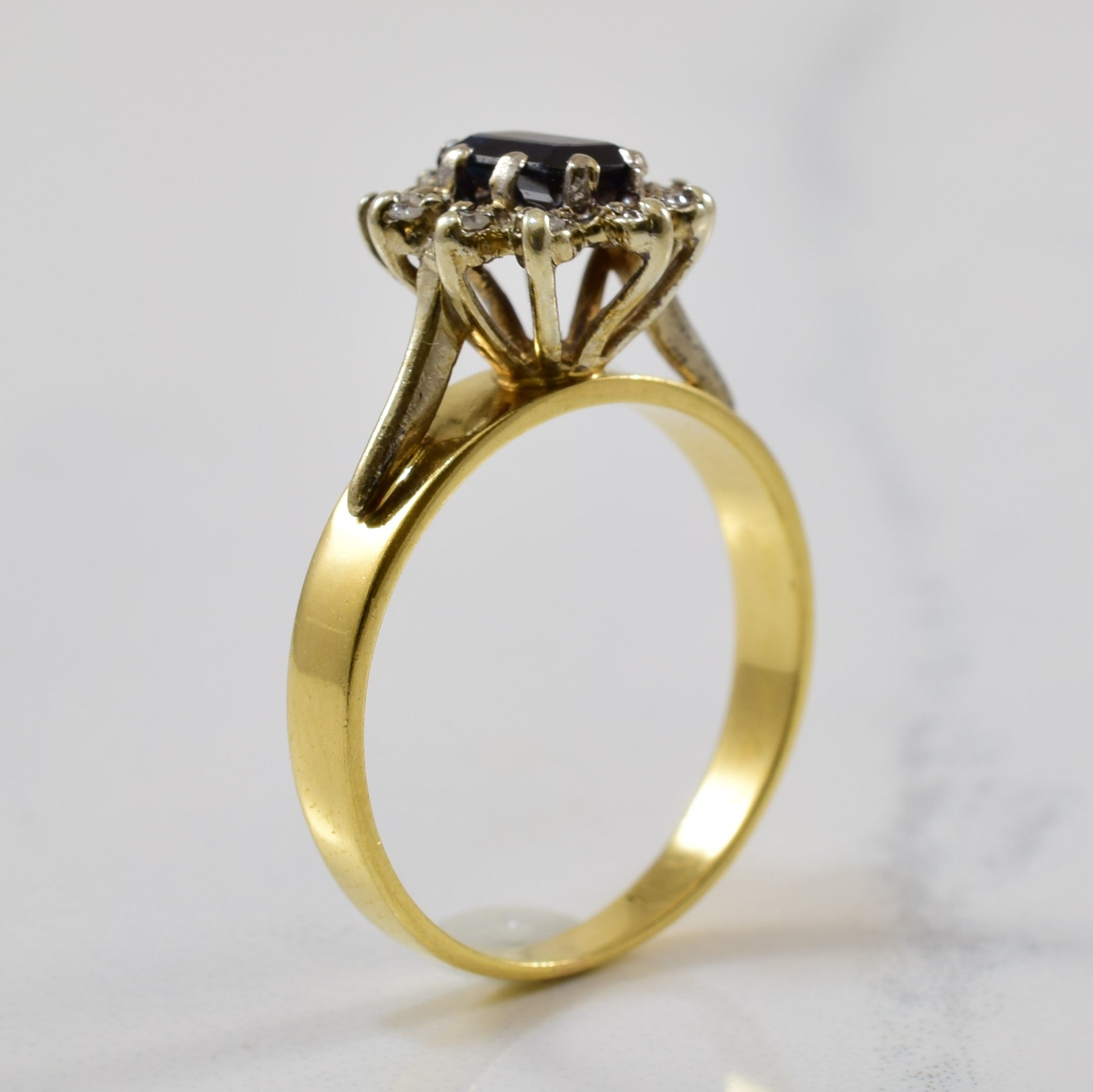 Blue Sapphire & Diamond Halo Ring | 0.65ct, 0.06ctw | SZ 6 |
