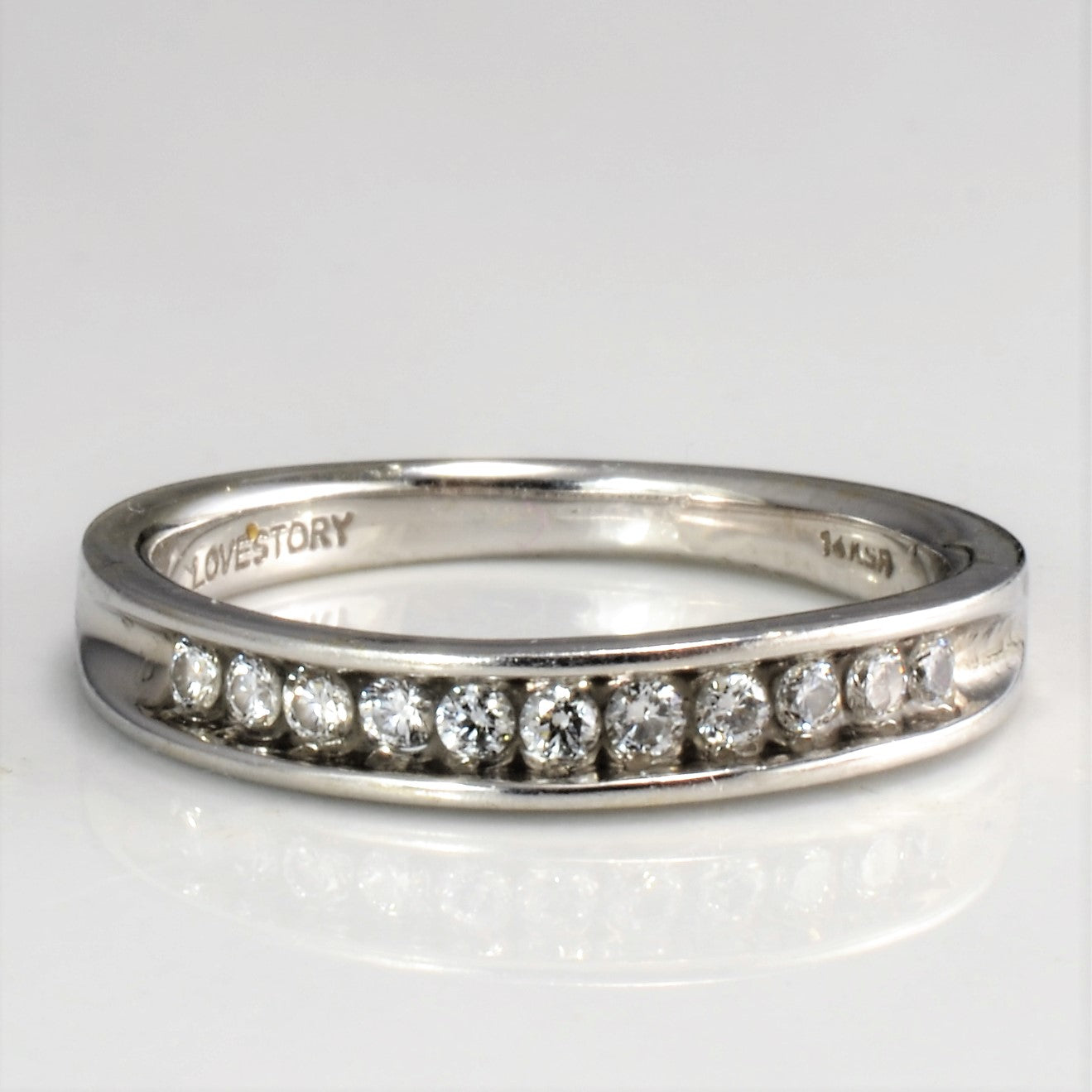 Channel Diamond Wedding Band | 0.15 ctw, SZ 4.75 |