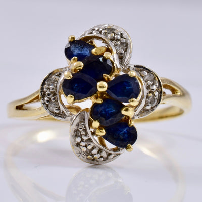 Floral Sapphire and Diamond Cluster Ring | 0.05 ctw SZ 7.5 |
