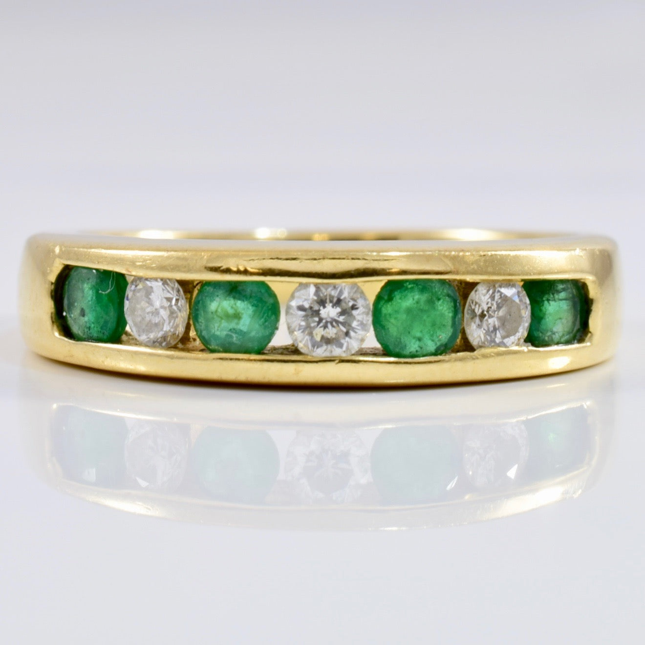 Channel Set Diamond and Emerald Ring | 0.18 ctw SZ 5.75 |