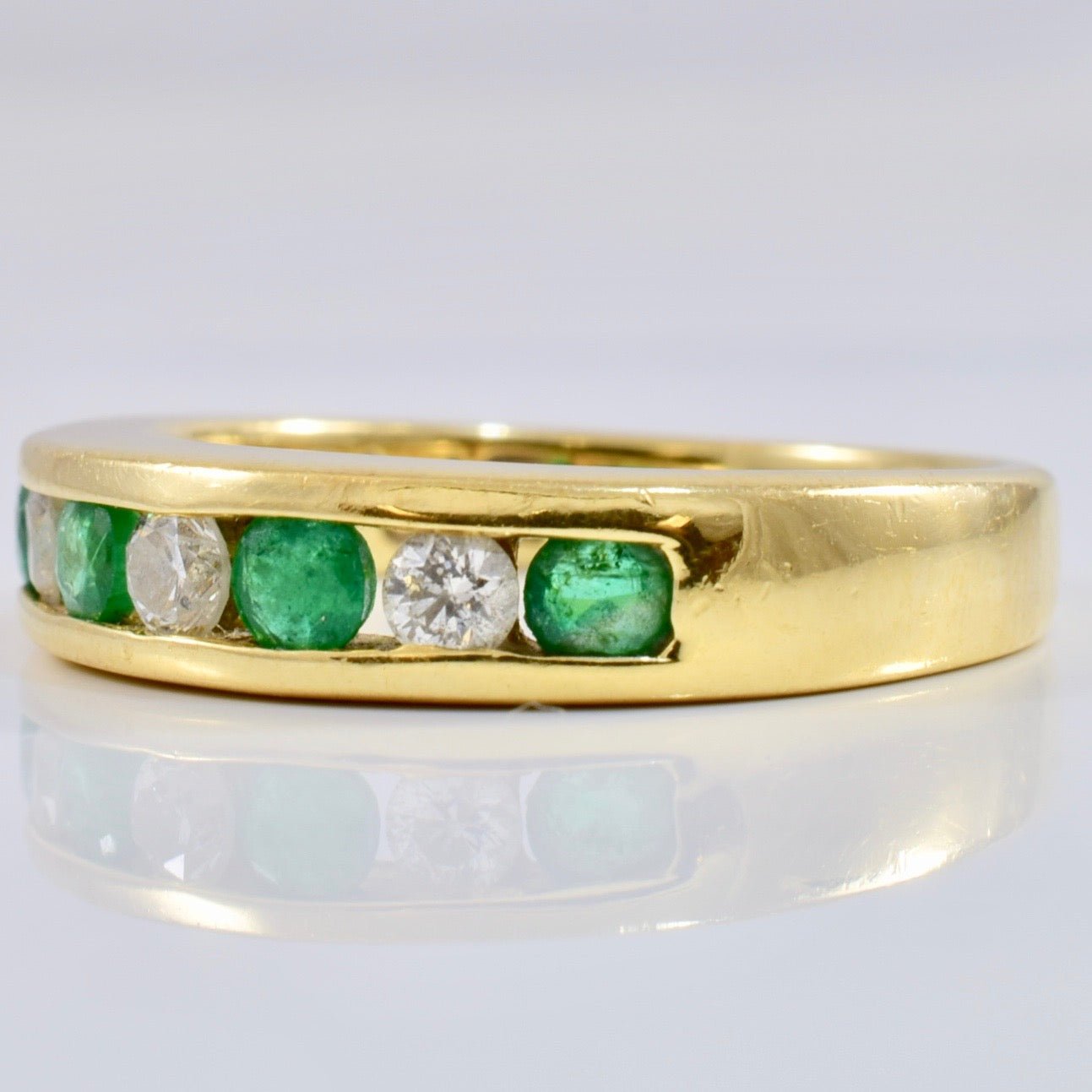 Channel Set Diamond and Emerald Ring | 0.18 ctw SZ 5.75 |
