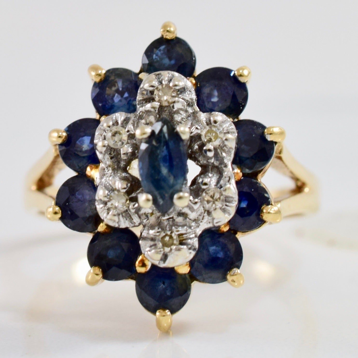 Diamond and Sapphire Cluster Ring | 0.05 ctw SZ 7.5 |