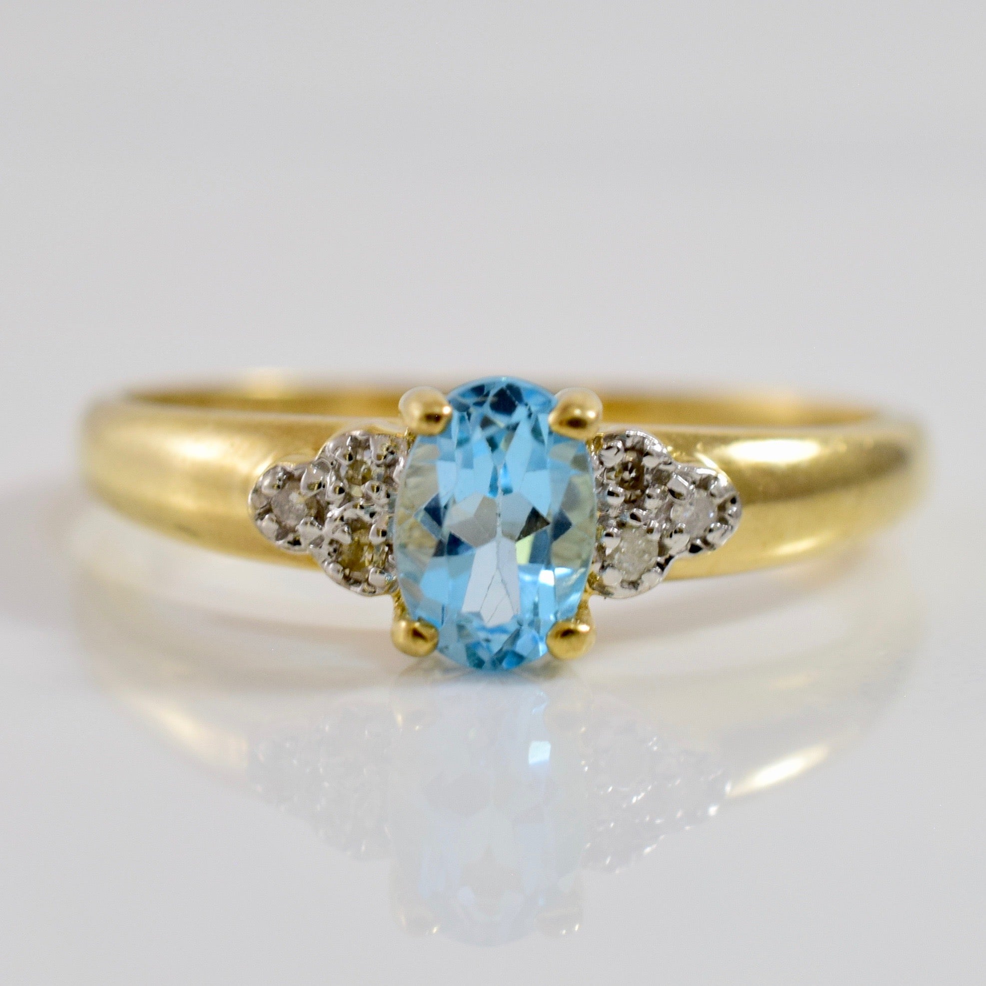 Blue Topaz and Diamond Cluster Accent | 0.02 ctw SZ 7 |