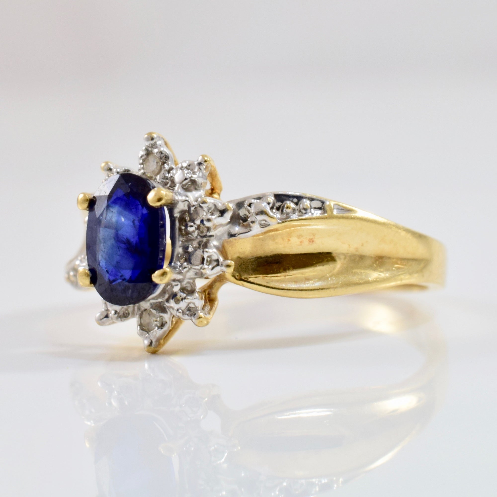 Sapphire and Diamond Bypass Ring | 0.01 ctw SZ 6.25 |