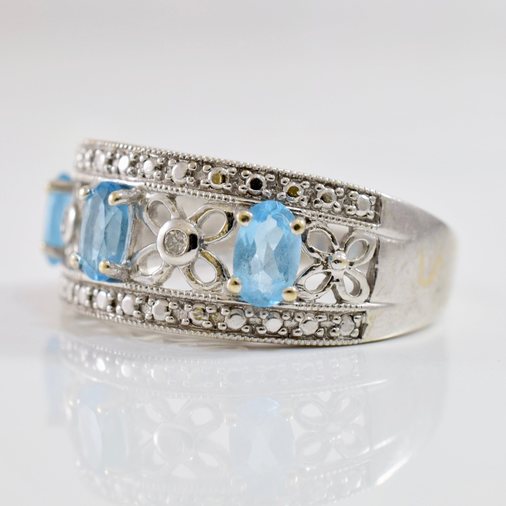 Diamond and Blue Topaz Ring | 0.02 ctw SZ 7 |