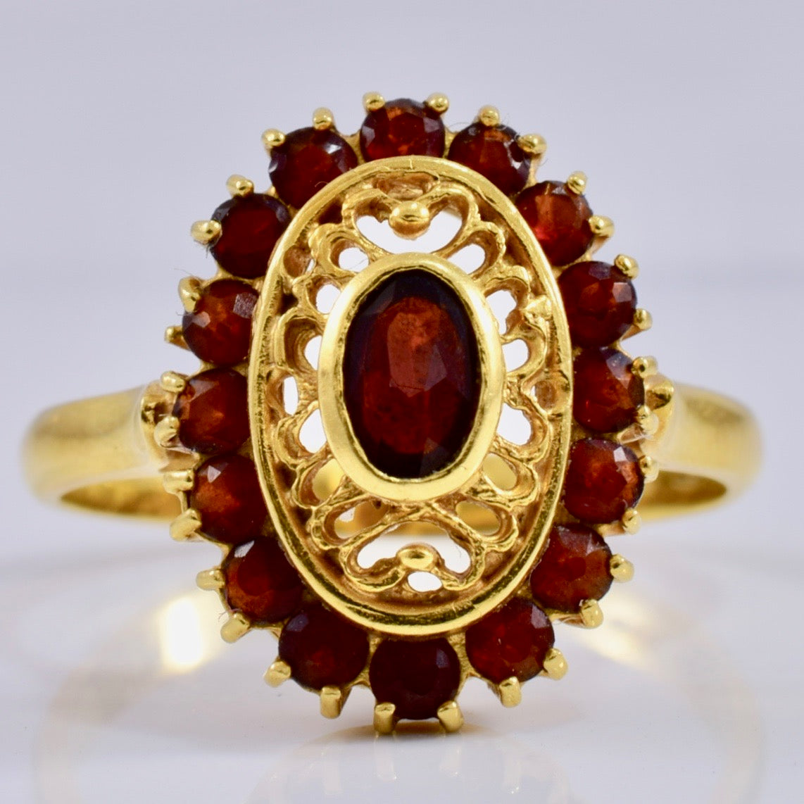 Intricate Gold and Garnet Ring | 0.75 ctw SZ 6.5 |