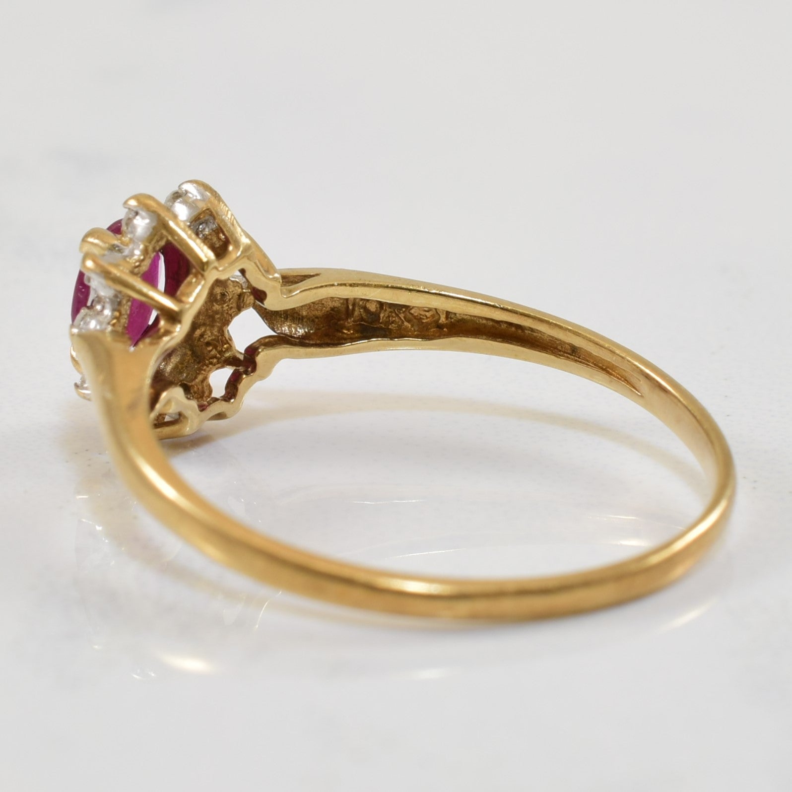 Ruby & Diamond Halo Ring | 0.50ct, 0.05ctw | SZ 6.75 |