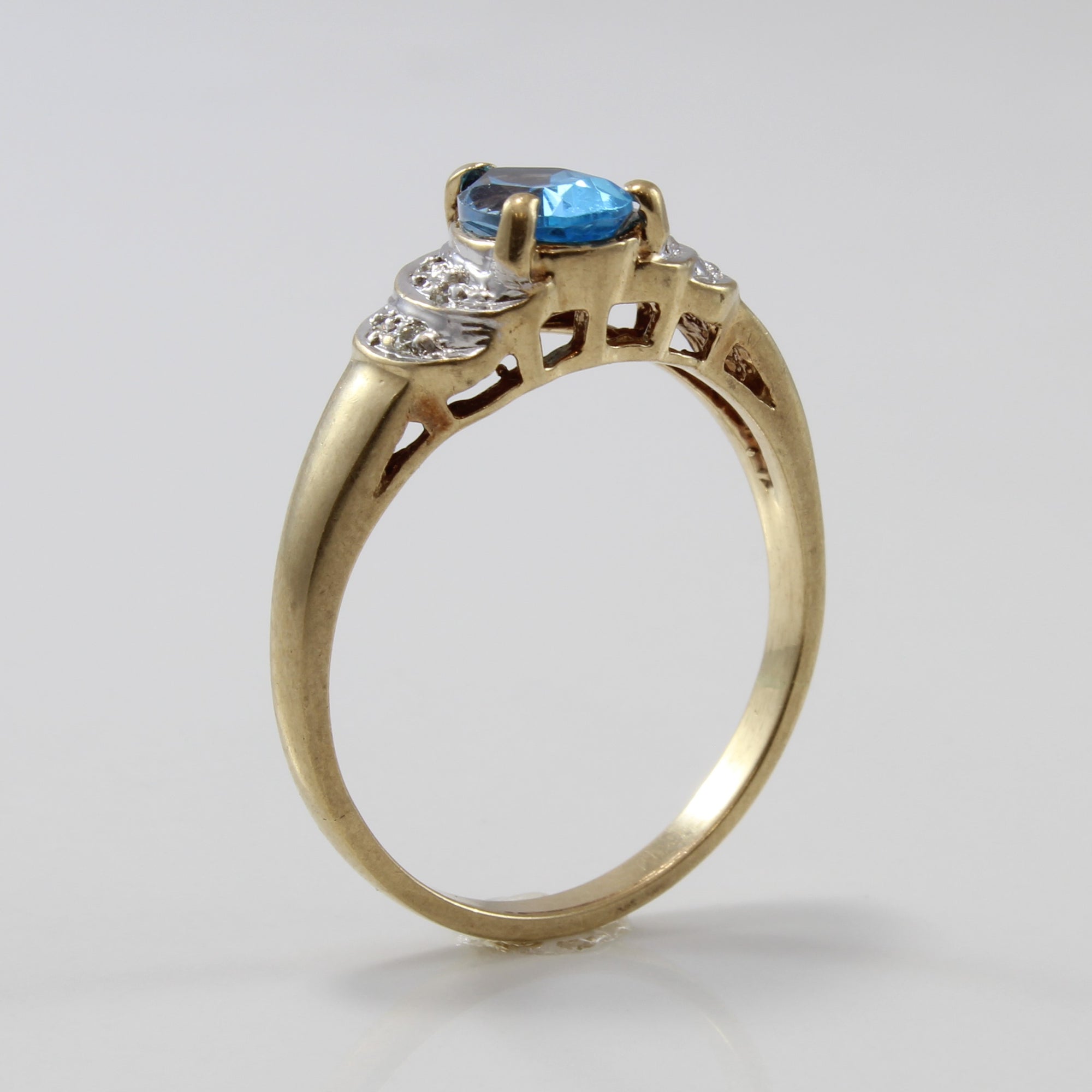 Brilliant Pear Cut Blue Topaz & Diamond Ring | 0.90ct, 0.04ctw | SZ 8.5 |