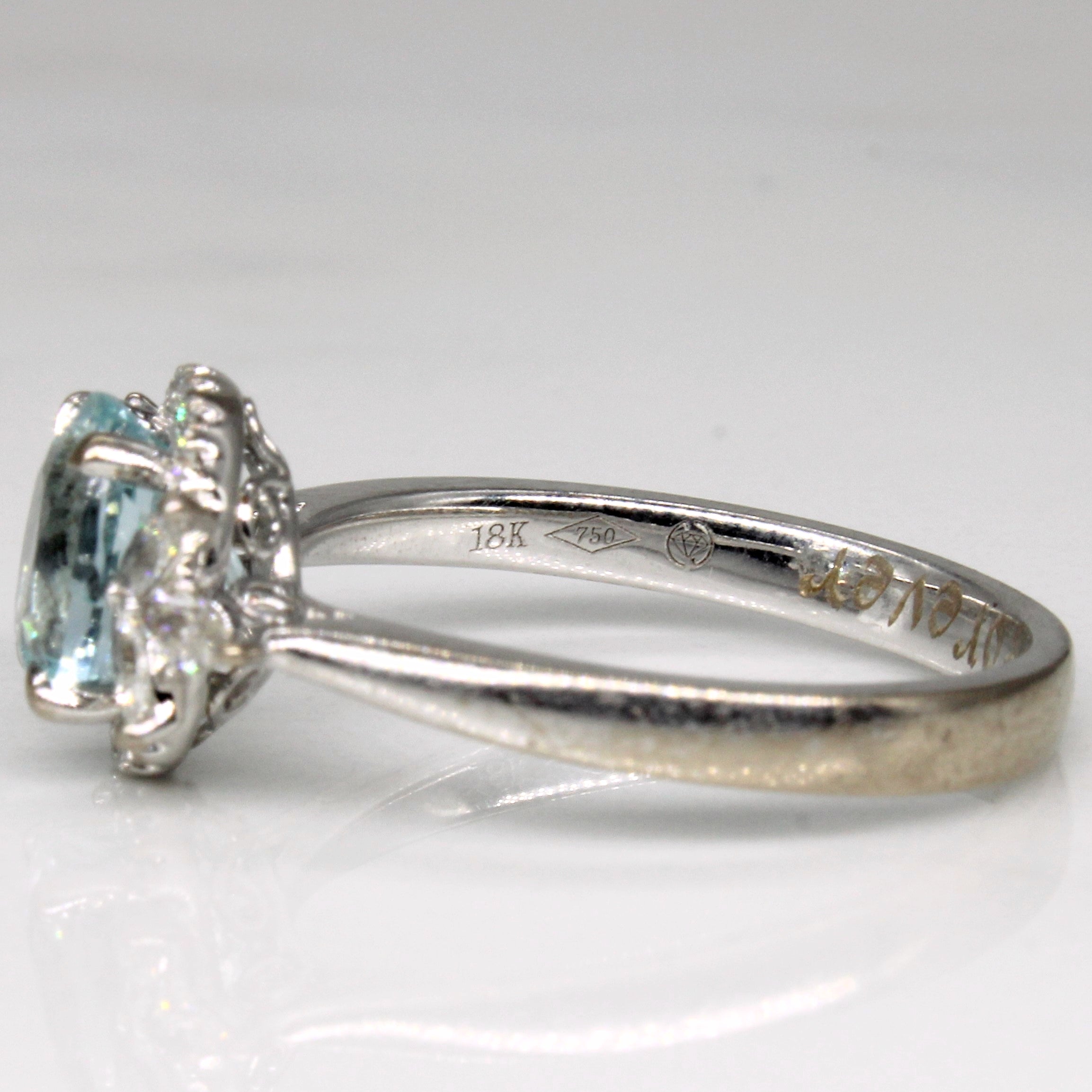 Bague de fiançailles halo aigue-marine et diamants | 1,18 ct, 0,28 ct au total | Taille 6 | 