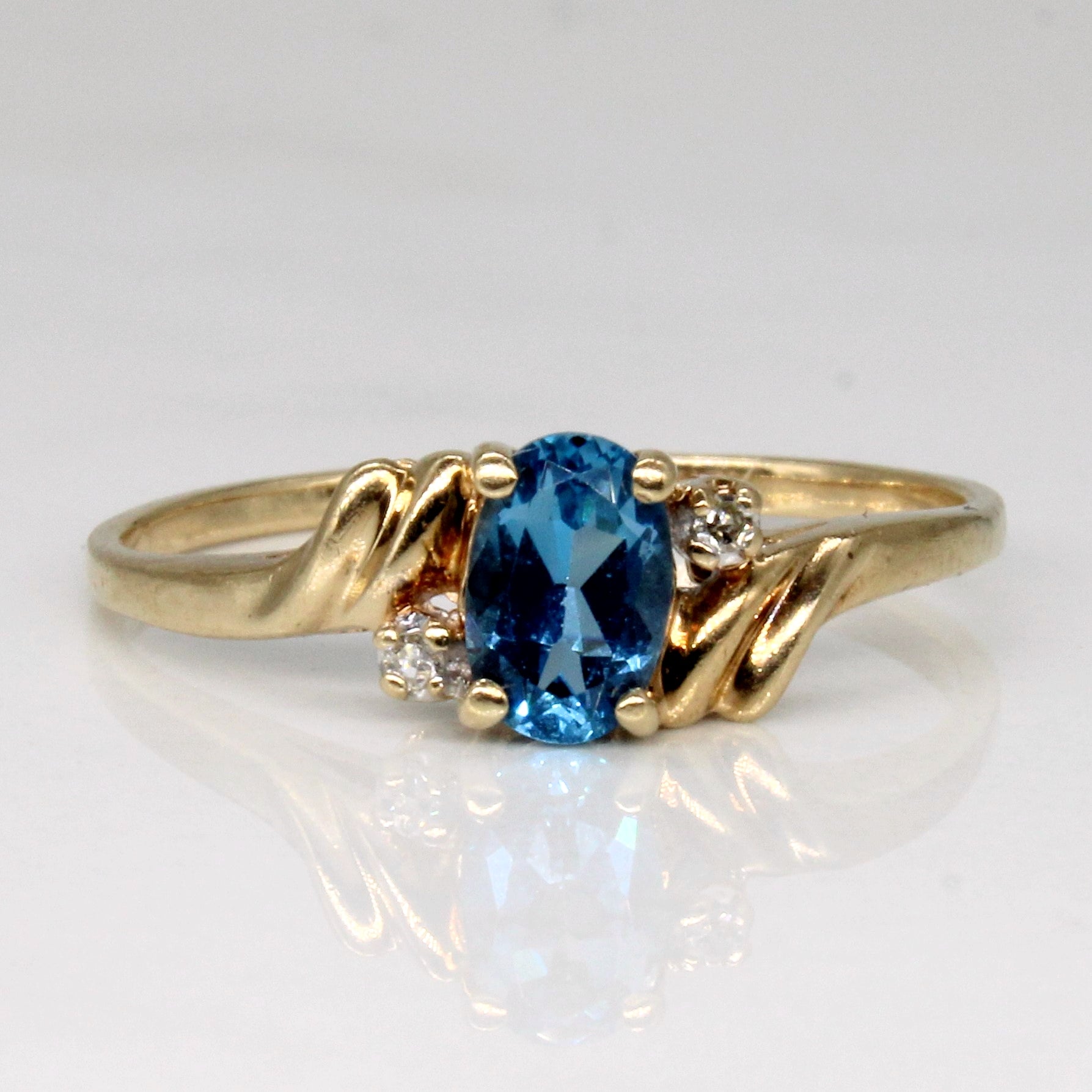 Blue Topaz & Diamond Bypass Ring | 0.46ct, 0.02ctw | SZ 7.25 |