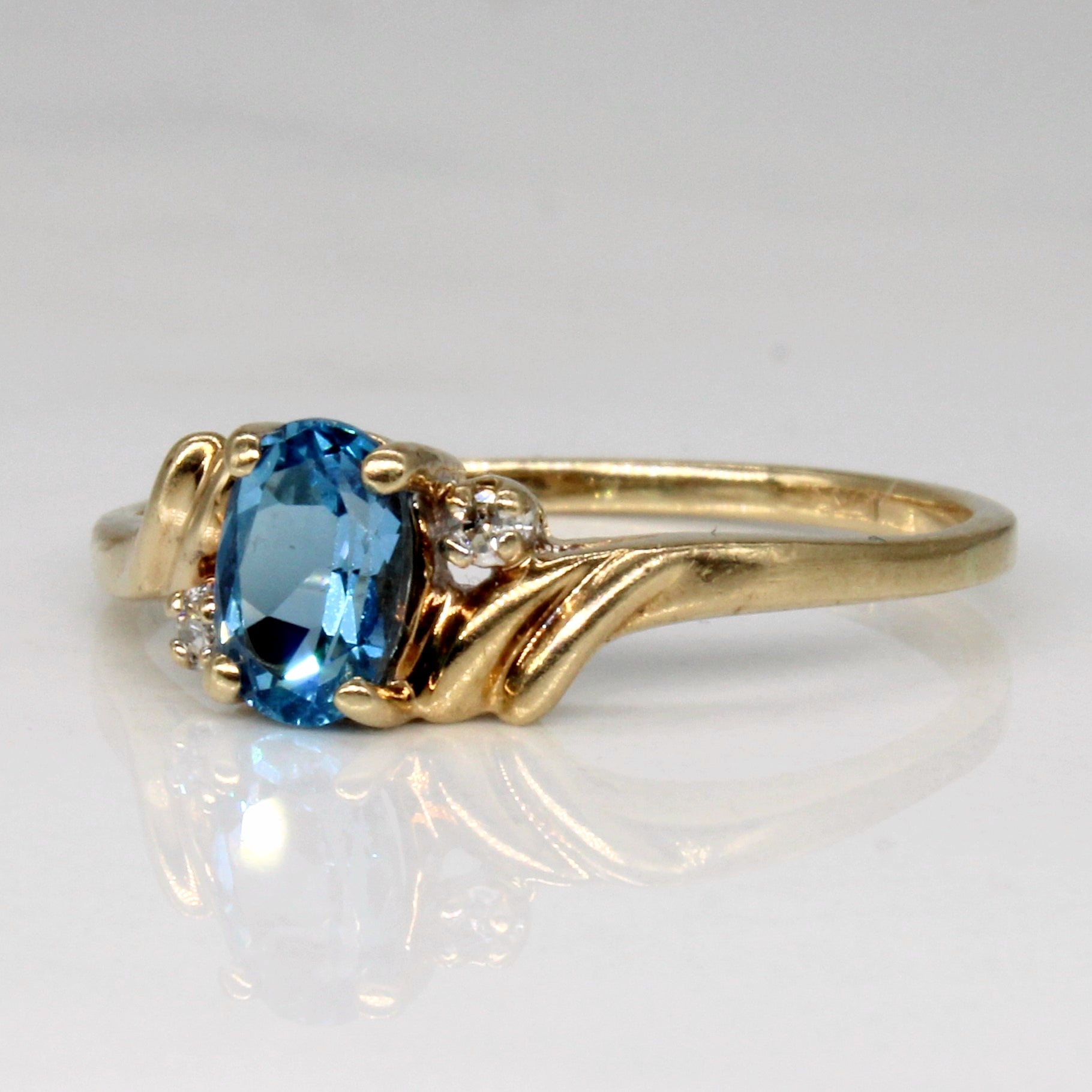 Blue Topaz & Diamond Bypass Ring | 0.46ct, 0.02ctw | SZ 7.25 |