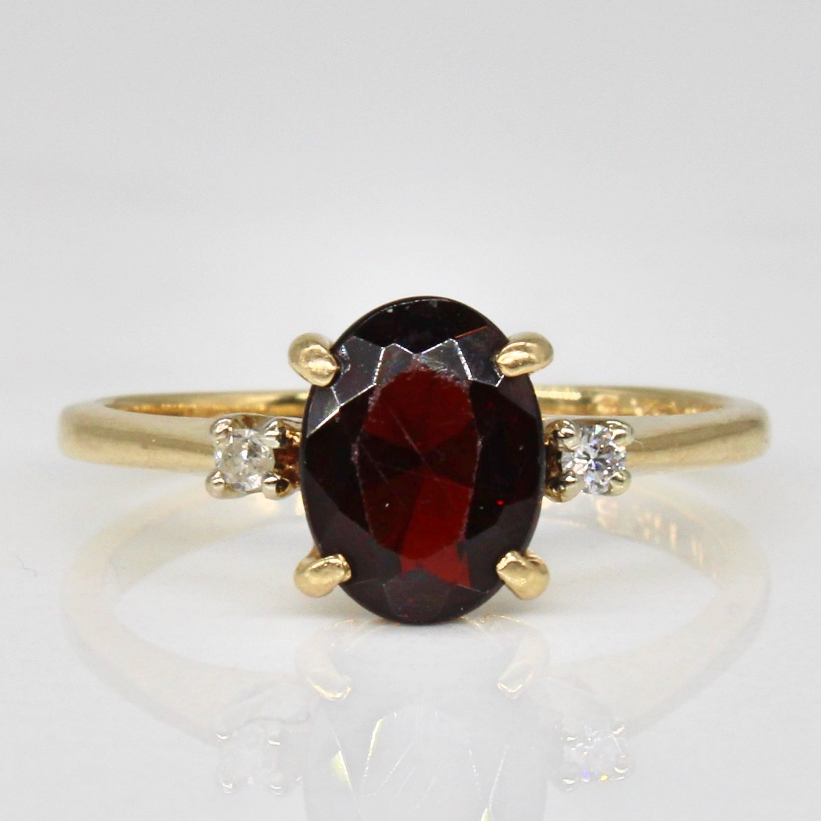 Garnet & Diamond Three Stone Ring | 1.00ct, 0.03ctw | SZ 5.5 |