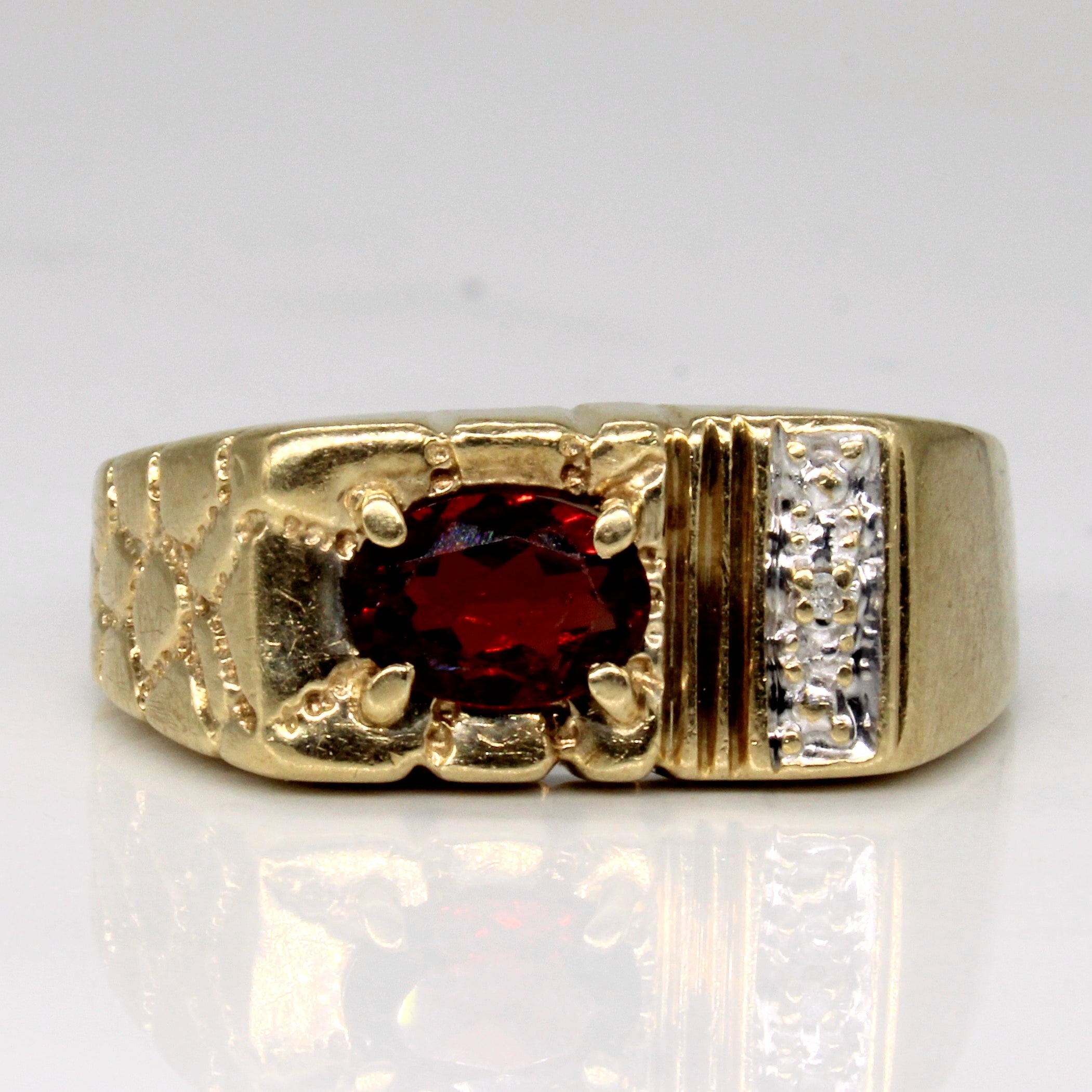 Garnet & Diamond Ring | 0.70ct, 0.01ct | SZ 9.5 |