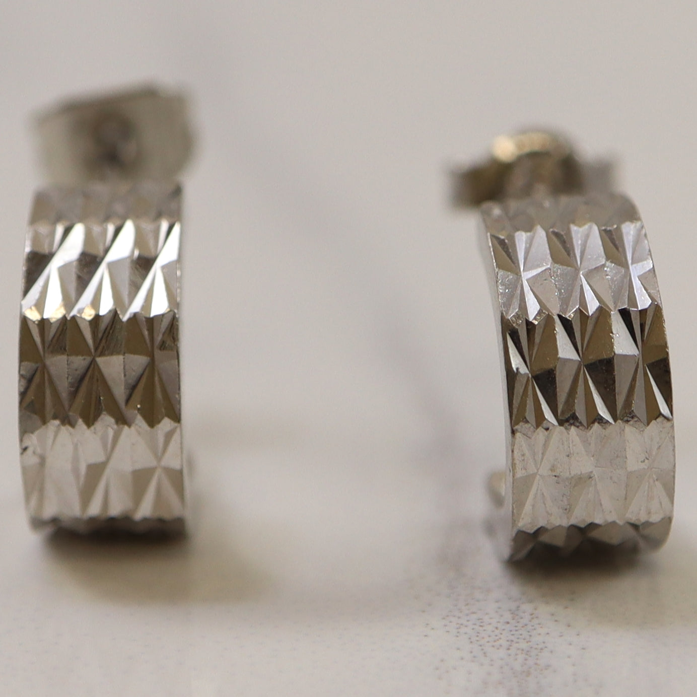 Diamond Cut Platinum Half Hoop Earrings |