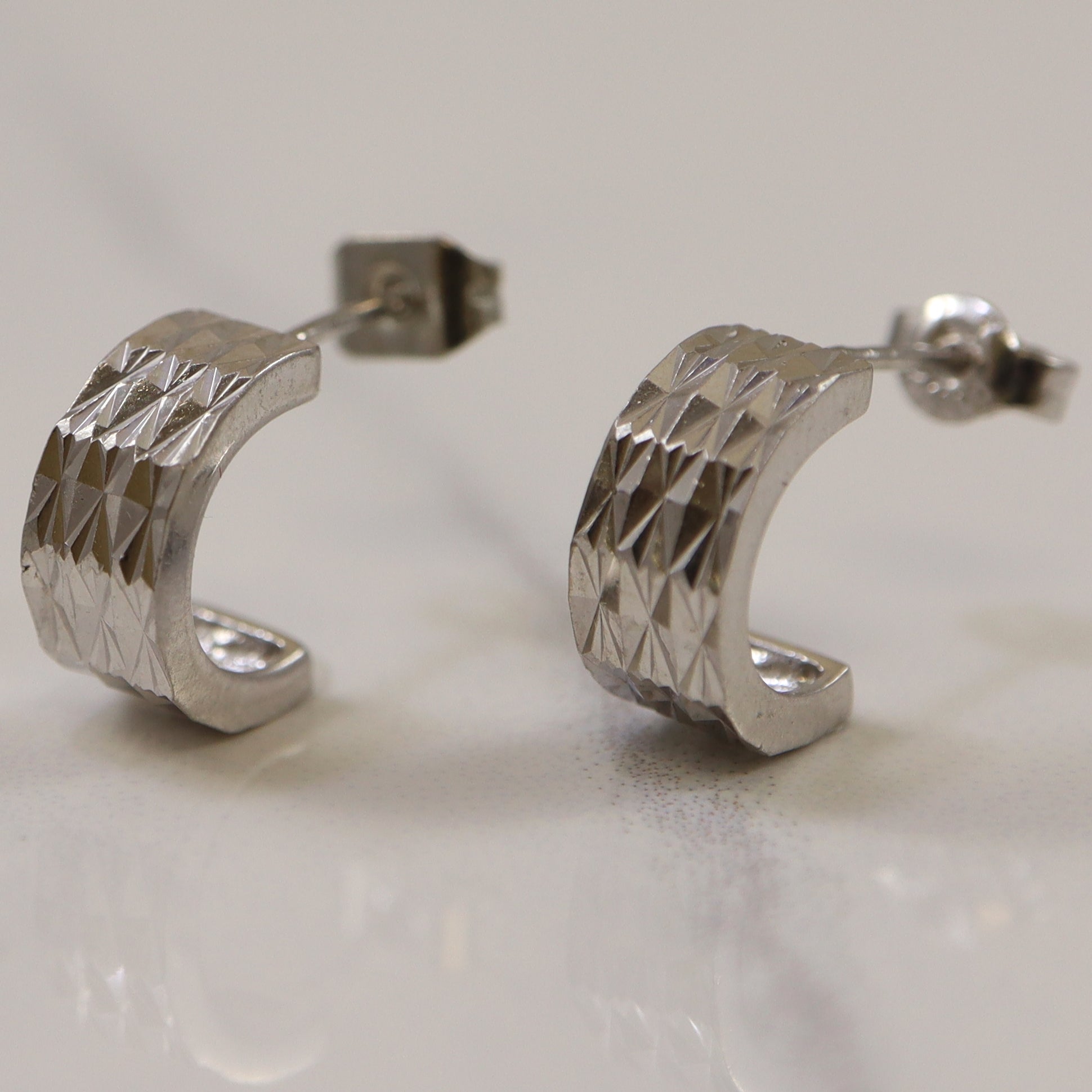 Diamond Cut Platinum Half Hoop Earrings |