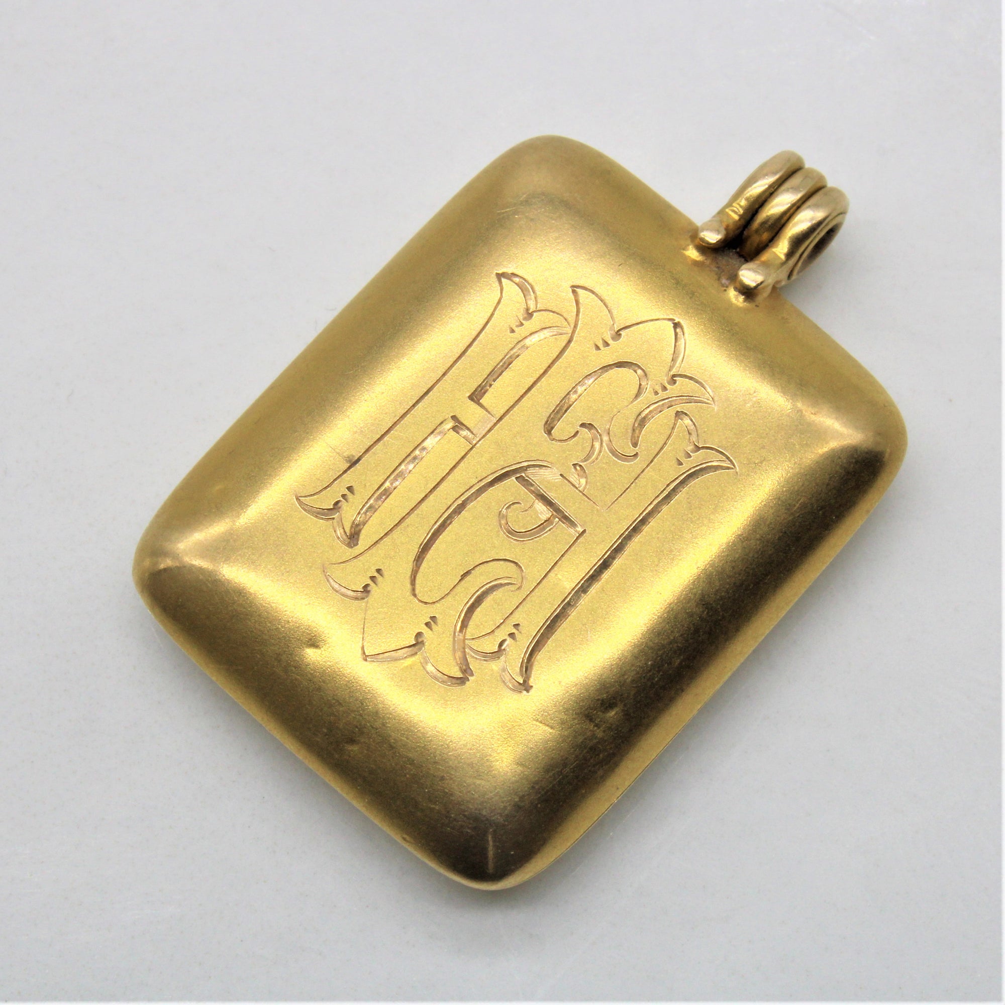 Mid Century Engraved Initial 'H.E.' Locket |