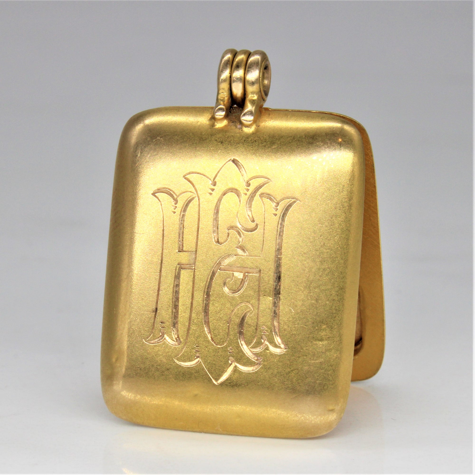 Mid Century Engraved Initial 'H.E.' Locket |