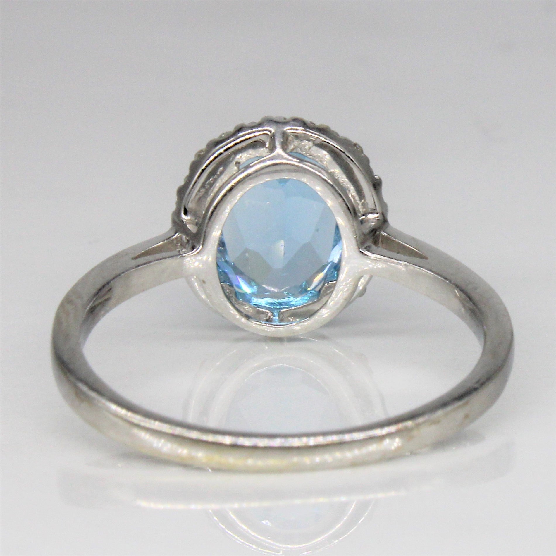 Blue Topaz & Diamond Halo Ring | 1.30ct, 0.07ctw | SZ 5.25 |