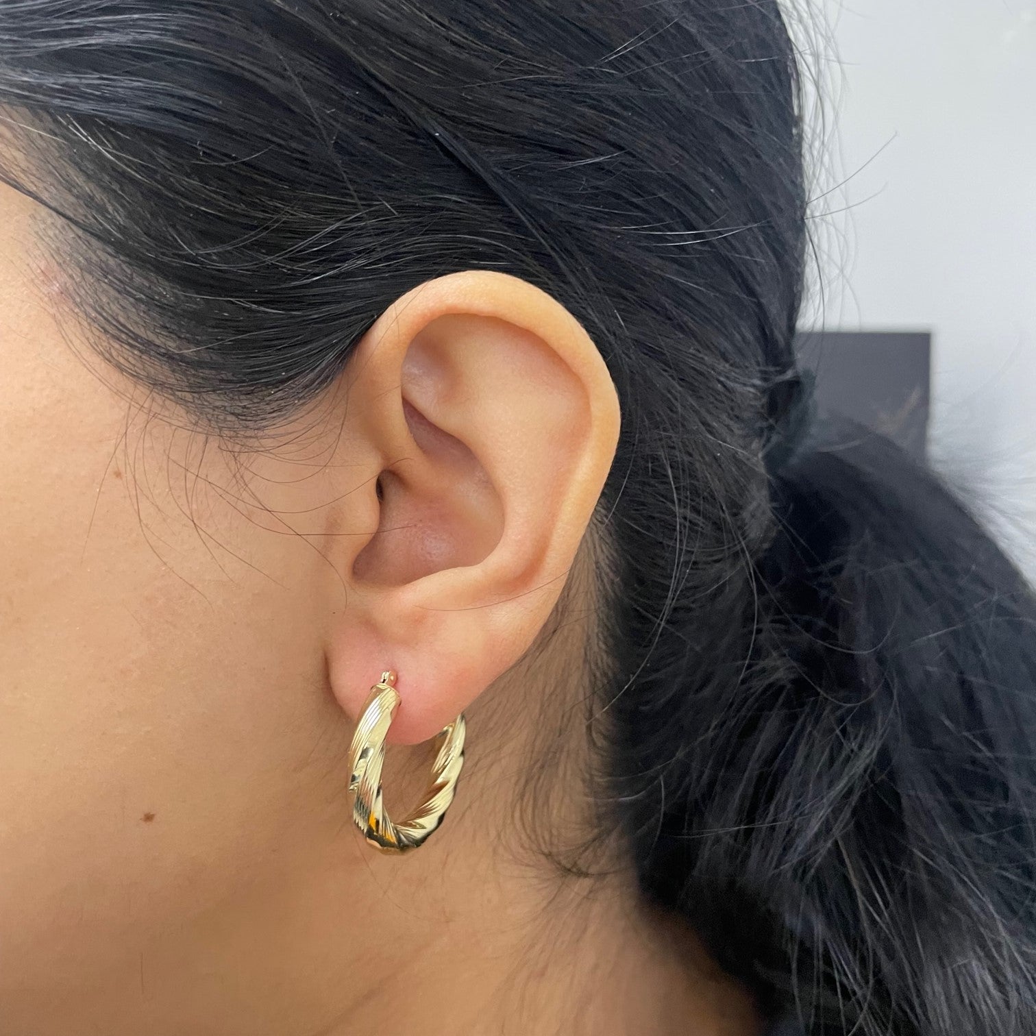 Twisted Gold Hoop Earrings |