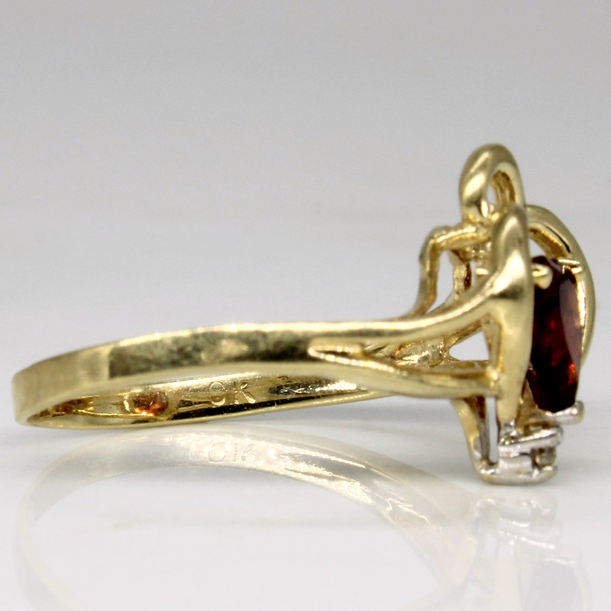 Garnet & Diamond Heart Ring | 0.60ct, 0.01ct | SZ 6.5 |