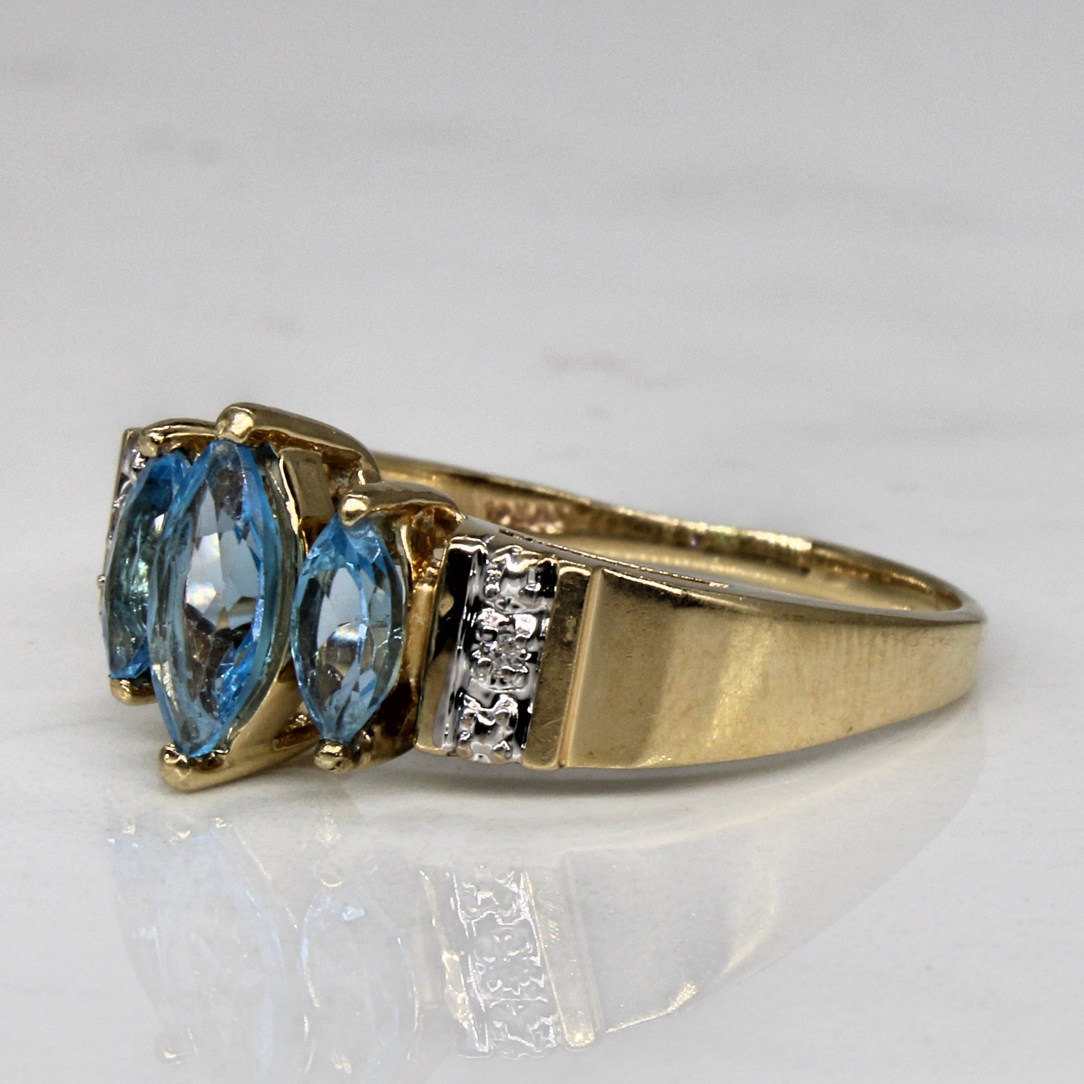 Three Stone Marquise Cut Blue Topaz Ring | 1.00ctw, 0.01ctw | SZ 8.5 |